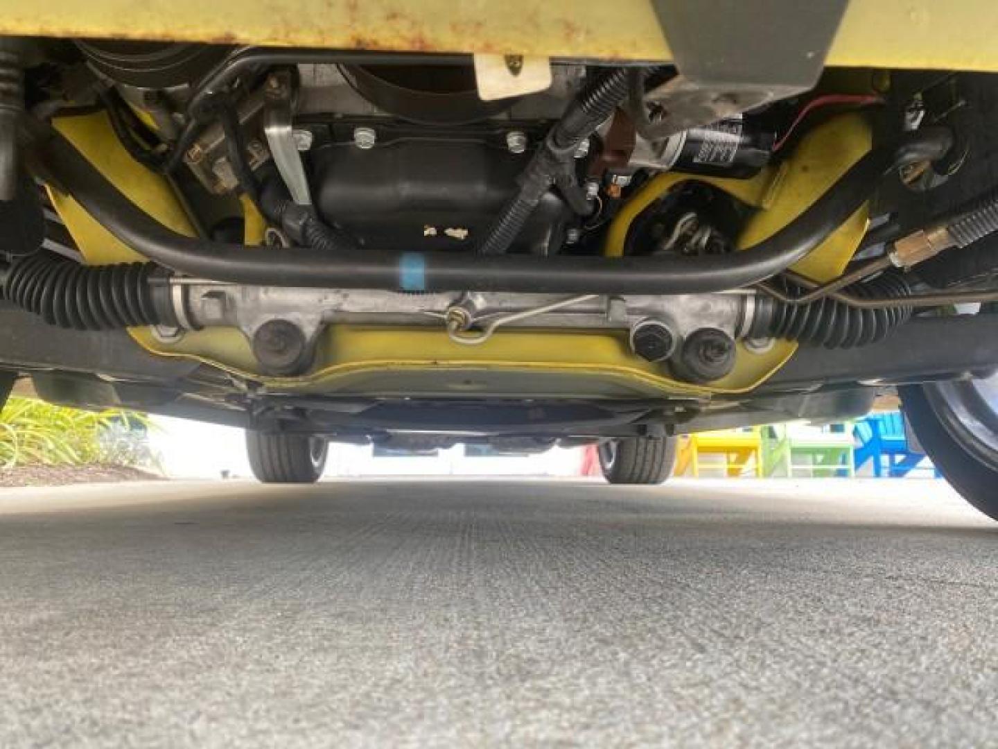 1999 Chrome Yellow /Oxford White Ford Mustang GT LOW MILES 8,145 1 OWNER FL CONV (1FAFP45X3XF) with an 4.6L SOHC SMPI V8 Engine engine, Automatic transmission, located at 4701 North Dixie Hwy, Pompano Beach, FL, 33064, (954) 422-2889, 26.240938, -80.123474 - OUR WEBPAGE FLORIDACARS1.COM HAS OVER 100 PHOTOS AND FREE CARFAX LINK 1999 FORD MUSTANG GT 1 OWNER VIN: 1FAFP45X3XF127745 1 F A F P 4 5 X 3 X F 1 2 7 7 4 5 CONVERTIBLE 4.6L V8 F SOHC 16V GASOLINE 24 MPG REAR WHEEL DRIVE Features ABS Brakes Air Conditioning Alloy Wheels AM/FM Stereo Automatic Transmi - Photo#21