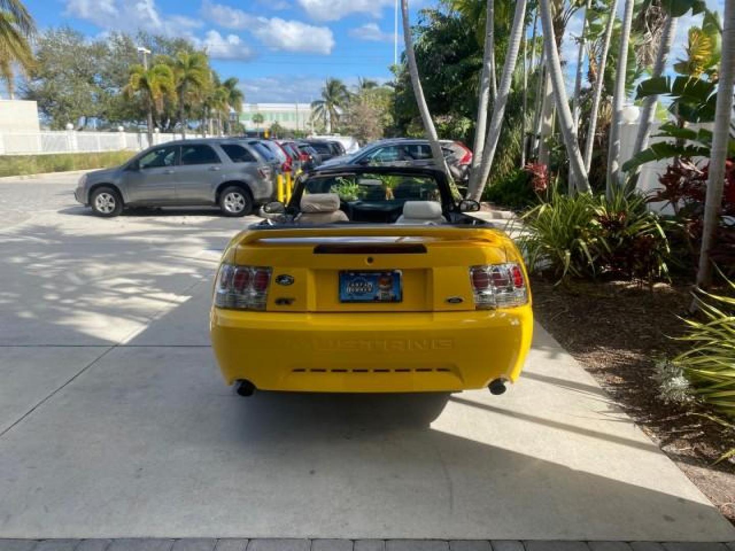 1999 Chrome Yellow /Oxford White Ford Mustang GT LOW MILES 8,145 1 OWNER FL CONV (1FAFP45X3XF) with an 4.6L SOHC SMPI V8 Engine engine, Automatic transmission, located at 4701 North Dixie Hwy, Pompano Beach, FL, 33064, (954) 422-2889, 26.240938, -80.123474 - OUR WEBPAGE FLORIDACARS1.COM HAS OVER 100 PHOTOS AND FREE CARFAX LINK 1999 FORD MUSTANG GT 1 OWNER VIN: 1FAFP45X3XF127745 1 F A F P 4 5 X 3 X F 1 2 7 7 4 5 CONVERTIBLE 4.6L V8 F SOHC 16V GASOLINE 24 MPG REAR WHEEL DRIVE Features ABS Brakes Air Conditioning Alloy Wheels AM/FM Stereo Automatic Transmi - Photo#43