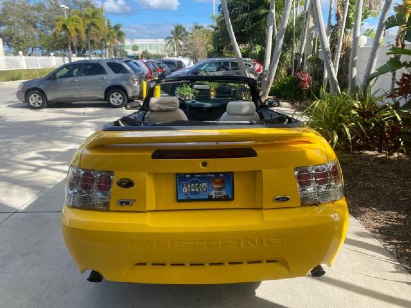 1999 Chrome Yellow /Oxford White Ford Mustang GT LOW MILES 8,145 1 OWNER FL CONV (1FAFP45X3XF) with an 4.6L SOHC SMPI V8 Engine engine, Automatic transmission, located at 4701 North Dixie Hwy, Pompano Beach, FL, 33064, (954) 422-2889, 26.240938, -80.123474 - OUR WEBPAGE FLORIDACARS1.COM HAS OVER 100 PHOTOS AND FREE CARFAX LINK 1999 FORD MUSTANG GT 1 OWNER VIN: 1FAFP45X3XF127745 1 F A F P 4 5 X 3 X F 1 2 7 7 4 5 CONVERTIBLE 4.6L V8 F SOHC 16V GASOLINE 24 MPG REAR WHEEL DRIVE Features ABS Brakes Air Conditioning Alloy Wheels AM/FM Stereo Automatic Transmi - Photo#45