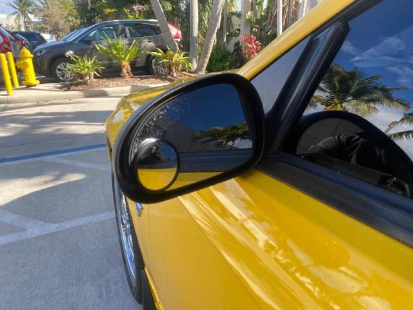 1999 Chrome Yellow /Oxford White Ford Mustang GT LOW MILES 8,145 1 OWNER FL CONV (1FAFP45X3XF) with an 4.6L SOHC SMPI V8 Engine engine, Automatic transmission, located at 4701 North Dixie Hwy, Pompano Beach, FL, 33064, (954) 422-2889, 26.240938, -80.123474 - OUR WEBPAGE FLORIDACARS1.COM HAS OVER 100 PHOTOS AND FREE CARFAX LINK 1999 FORD MUSTANG GT 1 OWNER VIN: 1FAFP45X3XF127745 1 F A F P 4 5 X 3 X F 1 2 7 7 4 5 CONVERTIBLE 4.6L V8 F SOHC 16V GASOLINE 24 MPG REAR WHEEL DRIVE Features ABS Brakes Air Conditioning Alloy Wheels AM/FM Stereo Automatic Transmi - Photo#67