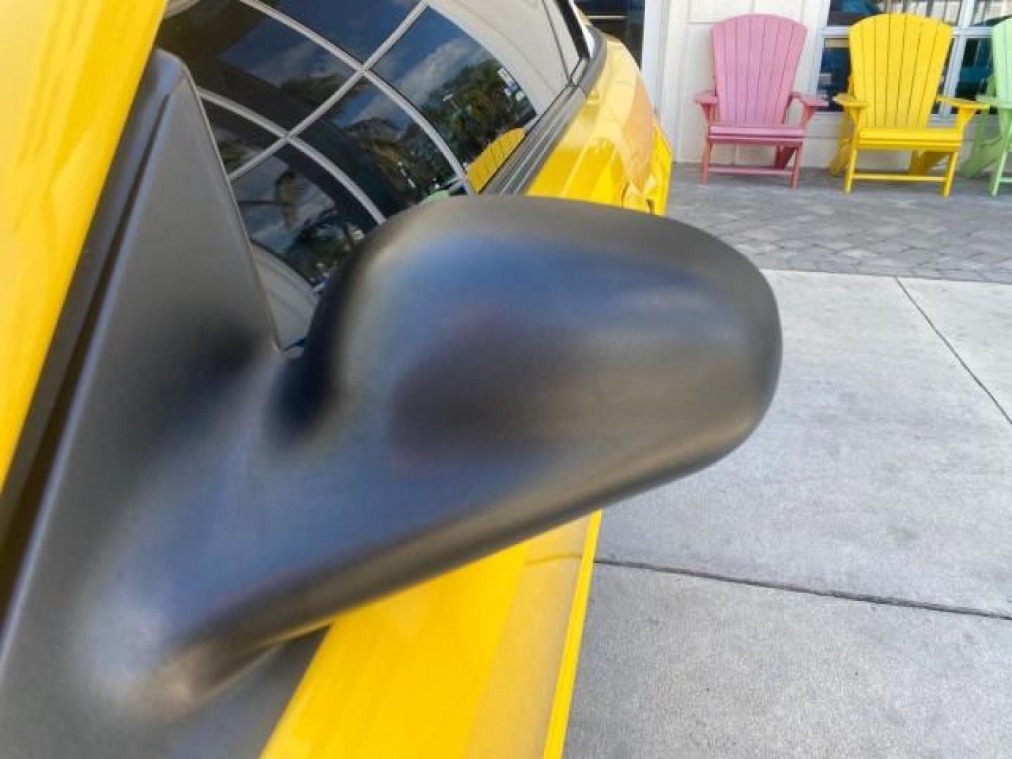 1999 Chrome Yellow /Oxford White Ford Mustang GT LOW MILES 8,145 1 OWNER FL CONV (1FAFP45X3XF) with an 4.6L SOHC SMPI V8 Engine engine, Automatic transmission, located at 4701 North Dixie Hwy, Pompano Beach, FL, 33064, (954) 422-2889, 26.240938, -80.123474 - OUR WEBPAGE FLORIDACARS1.COM HAS OVER 100 PHOTOS AND FREE CARFAX LINK 1999 FORD MUSTANG GT 1 OWNER VIN: 1FAFP45X3XF127745 1 F A F P 4 5 X 3 X F 1 2 7 7 4 5 CONVERTIBLE 4.6L V8 F SOHC 16V GASOLINE 24 MPG REAR WHEEL DRIVE Features ABS Brakes Air Conditioning Alloy Wheels AM/FM Stereo Automatic Transmi - Photo#68