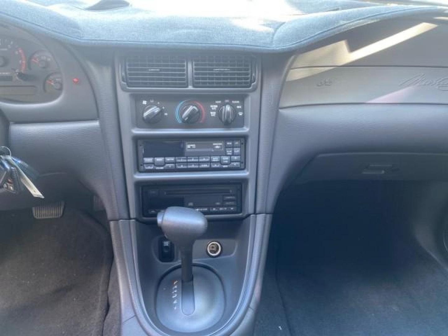 1999 Chrome Yellow /Oxford White Ford Mustang GT LOW MILES 8,145 1 OWNER FL CONV (1FAFP45X3XF) with an 4.6L SOHC SMPI V8 Engine engine, Automatic transmission, located at 4701 North Dixie Hwy, Pompano Beach, FL, 33064, (954) 422-2889, 26.240938, -80.123474 - OUR WEBPAGE FLORIDACARS1.COM HAS OVER 100 PHOTOS AND FREE CARFAX LINK 1999 FORD MUSTANG GT 1 OWNER VIN: 1FAFP45X3XF127745 1 F A F P 4 5 X 3 X F 1 2 7 7 4 5 CONVERTIBLE 4.6L V8 F SOHC 16V GASOLINE 24 MPG REAR WHEEL DRIVE Features ABS Brakes Air Conditioning Alloy Wheels AM/FM Stereo Automatic Transmi - Photo#83