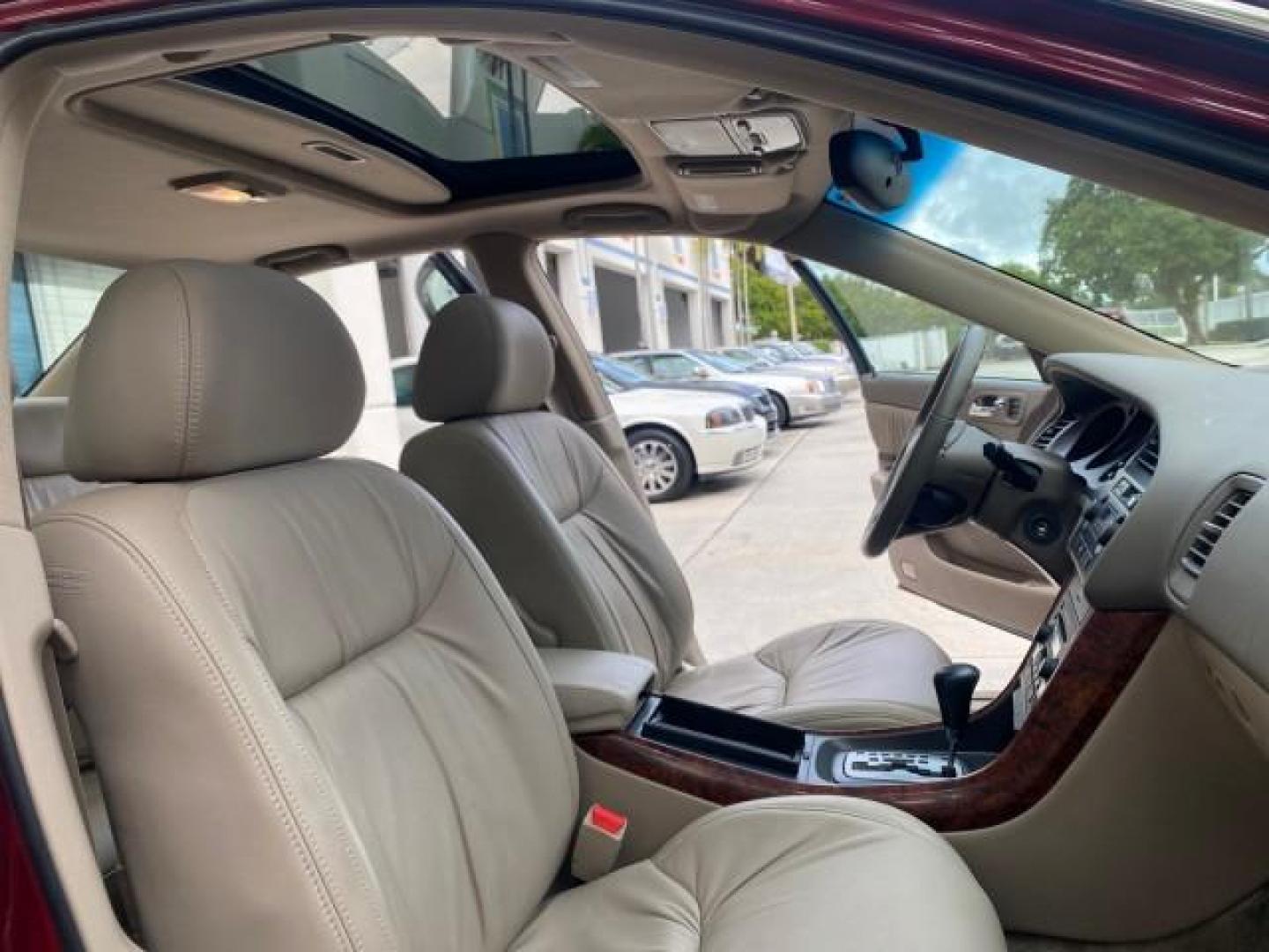 2002 Firepepper Red Pearl /Parchment Acura TL 3.2 LOW MILES 36,004 (19UUA566X2A) with an 3.2L SOHC PGM-FI 24-Valve V6 Engine engine, Automatic transmission, located at 4701 North Dixie Hwy, Pompano Beach, FL, 33064, (954) 422-2889, 26.240938, -80.123474 - OUR WEBPAGE FLORIDACARS1.COM HAS OVER 100 PHOTOS AND FREE CARFAX LINK 2002 ACURA TL 3.2 THIS IS THE LOWEST MILE ONE IN THE COUNTRY LOOKS ALL ORIGINAL PAINT ORIGINAL PRICE $28,880 VIN: 19UUA566X2A037479 1 9 U U A 5 6 6 X 2 A 0 3 7 4 7 9 SEDAN 4 DR 3.2L V6 F SOHC 24V GASOLINE 29 MPG FRONT WHEEL DRIVE - Photo#12