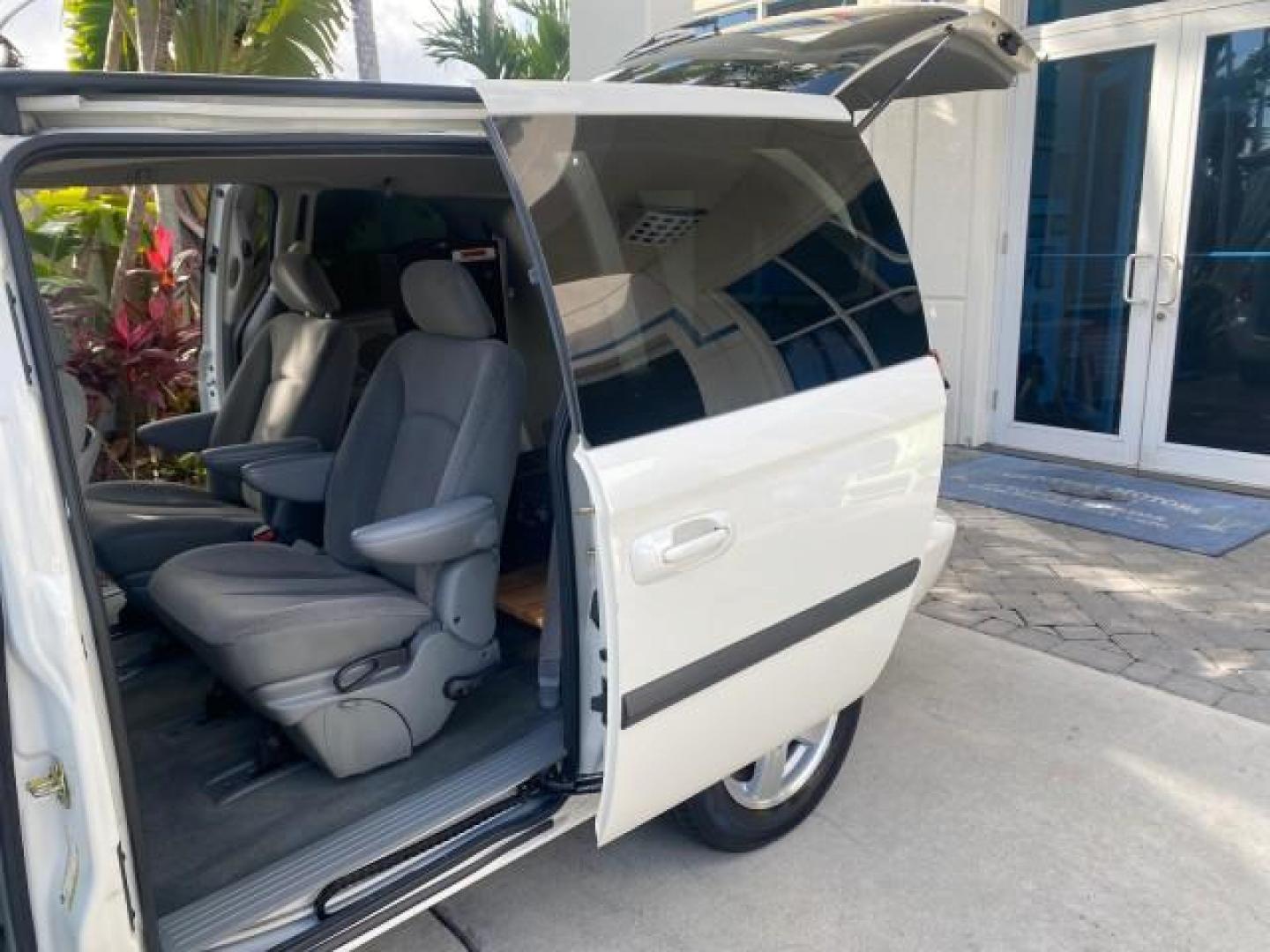 2006 Stone White /Medium Slate Gray Dodge Caravan SXT LOW MILES 28,367 1 OWNER HANDICAP LIFT (1D4GP45R96B) with an 3.3L OHV V6 Engine engine, Automatic transmission, located at 4701 North Dixie Hwy, Pompano Beach, FL, 33064, (954) 422-2889, 26.240938, -80.123474 - OUR WEBPAGE FLORIDACARS1.COM HAS OVER 100 PHOTOS AND FREE CARFAX LINK 2006 DODGE CARAVAN SXT 1 OWNER FREEDOM HANDICAP LIFT/SCOOTER VIN: 1D4GP45R96B730062 1 D 4 G P 4 5 R 9 6 B 7 3 0 0 6 2 VAN 3.3L V6 F OHV GASOLINE 26 MPG FRONT WHEEL DRIVE Features Air Conditioning Alloy Wheels AM/FM Stereo Automati- Photo#13