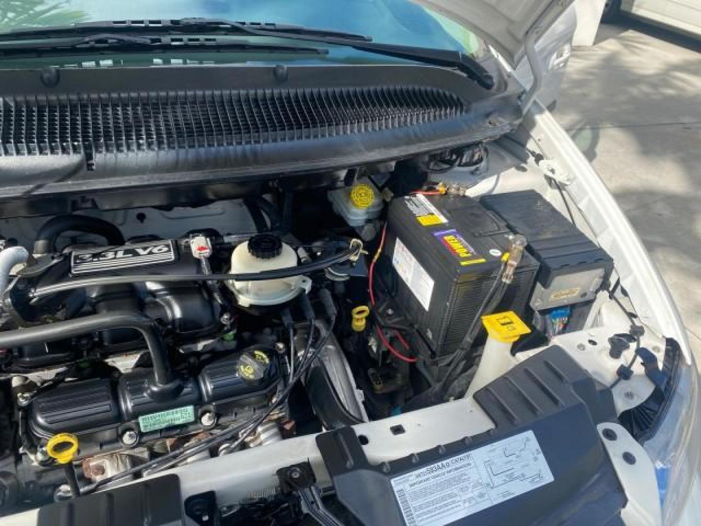 2006 Stone White /Medium Slate Gray Dodge Caravan SXT LOW MILES 28,367 1 OWNER HANDICAP LIFT (1D4GP45R96B) with an 3.3L OHV V6 Engine engine, Automatic transmission, located at 4701 North Dixie Hwy, Pompano Beach, FL, 33064, (954) 422-2889, 26.240938, -80.123474 - OUR WEBPAGE FLORIDACARS1.COM HAS OVER 100 PHOTOS AND FREE CARFAX LINK 2006 DODGE CARAVAN SXT 1 OWNER FREEDOM HANDICAP LIFT/SCOOTER VIN: 1D4GP45R96B730062 1 D 4 G P 4 5 R 9 6 B 7 3 0 0 6 2 VAN 3.3L V6 F OHV GASOLINE 26 MPG FRONT WHEEL DRIVE Features Air Conditioning Alloy Wheels AM/FM Stereo Automati- Photo#25