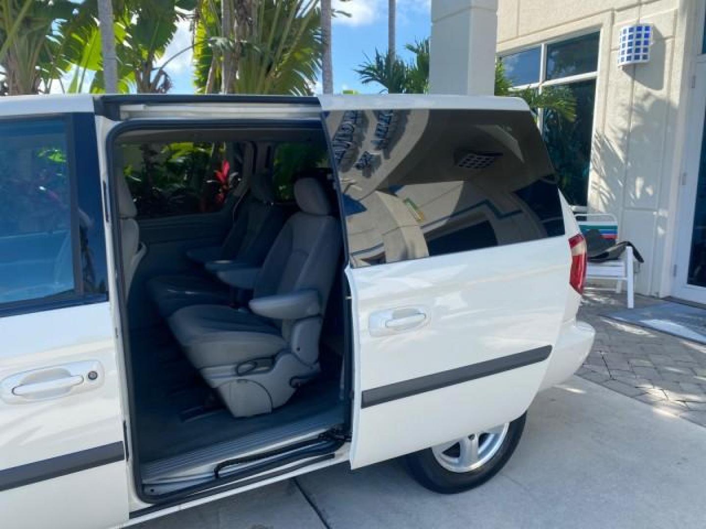 2006 Stone White /Medium Slate Gray Dodge Caravan SXT LOW MILES 28,367 1 OWNER HANDICAP LIFT (1D4GP45R96B) with an 3.3L OHV V6 Engine engine, Automatic transmission, located at 4701 North Dixie Hwy, Pompano Beach, FL, 33064, (954) 422-2889, 26.240938, -80.123474 - OUR WEBPAGE FLORIDACARS1.COM HAS OVER 100 PHOTOS AND FREE CARFAX LINK 2006 DODGE CARAVAN SXT 1 OWNER FREEDOM HANDICAP LIFT/SCOOTER VIN: 1D4GP45R96B730062 1 D 4 G P 4 5 R 9 6 B 7 3 0 0 6 2 VAN 3.3L V6 F OHV GASOLINE 26 MPG FRONT WHEEL DRIVE Features Air Conditioning Alloy Wheels AM/FM Stereo Automati- Photo#69