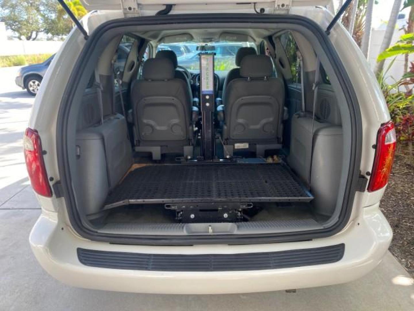 2006 Stone White /Medium Slate Gray Dodge Caravan SXT LOW MILES 28,367 1 OWNER HANDICAP LIFT (1D4GP45R96B) with an 3.3L OHV V6 Engine engine, Automatic transmission, located at 4701 North Dixie Hwy, Pompano Beach, FL, 33064, (954) 422-2889, 26.240938, -80.123474 - OUR WEBPAGE FLORIDACARS1.COM HAS OVER 100 PHOTOS AND FREE CARFAX LINK 2006 DODGE CARAVAN SXT 1 OWNER FREEDOM HANDICAP LIFT/SCOOTER VIN: 1D4GP45R96B730062 1 D 4 G P 4 5 R 9 6 B 7 3 0 0 6 2 VAN 3.3L V6 F OHV GASOLINE 26 MPG FRONT WHEEL DRIVE Features Air Conditioning Alloy Wheels AM/FM Stereo Automati- Photo#87