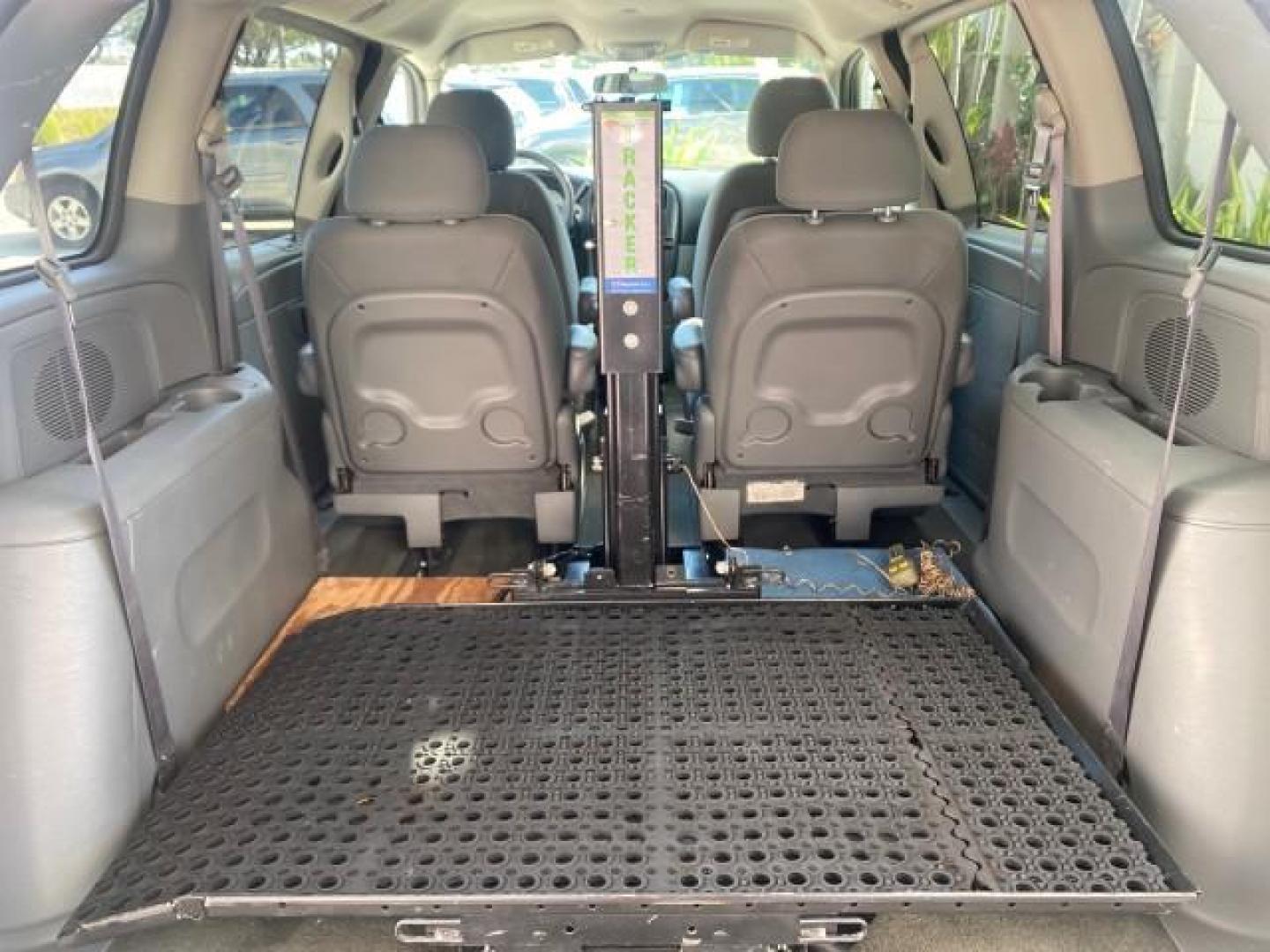 2006 Stone White /Medium Slate Gray Dodge Caravan SXT LOW MILES 28,367 1 OWNER HANDICAP LIFT (1D4GP45R96B) with an 3.3L OHV V6 Engine engine, Automatic transmission, located at 4701 North Dixie Hwy, Pompano Beach, FL, 33064, (954) 422-2889, 26.240938, -80.123474 - OUR WEBPAGE FLORIDACARS1.COM HAS OVER 100 PHOTOS AND FREE CARFAX LINK 2006 DODGE CARAVAN SXT 1 OWNER FREEDOM HANDICAP LIFT/SCOOTER VIN: 1D4GP45R96B730062 1 D 4 G P 4 5 R 9 6 B 7 3 0 0 6 2 VAN 3.3L V6 F OHV GASOLINE 26 MPG FRONT WHEEL DRIVE Features Air Conditioning Alloy Wheels AM/FM Stereo Automati- Photo#88