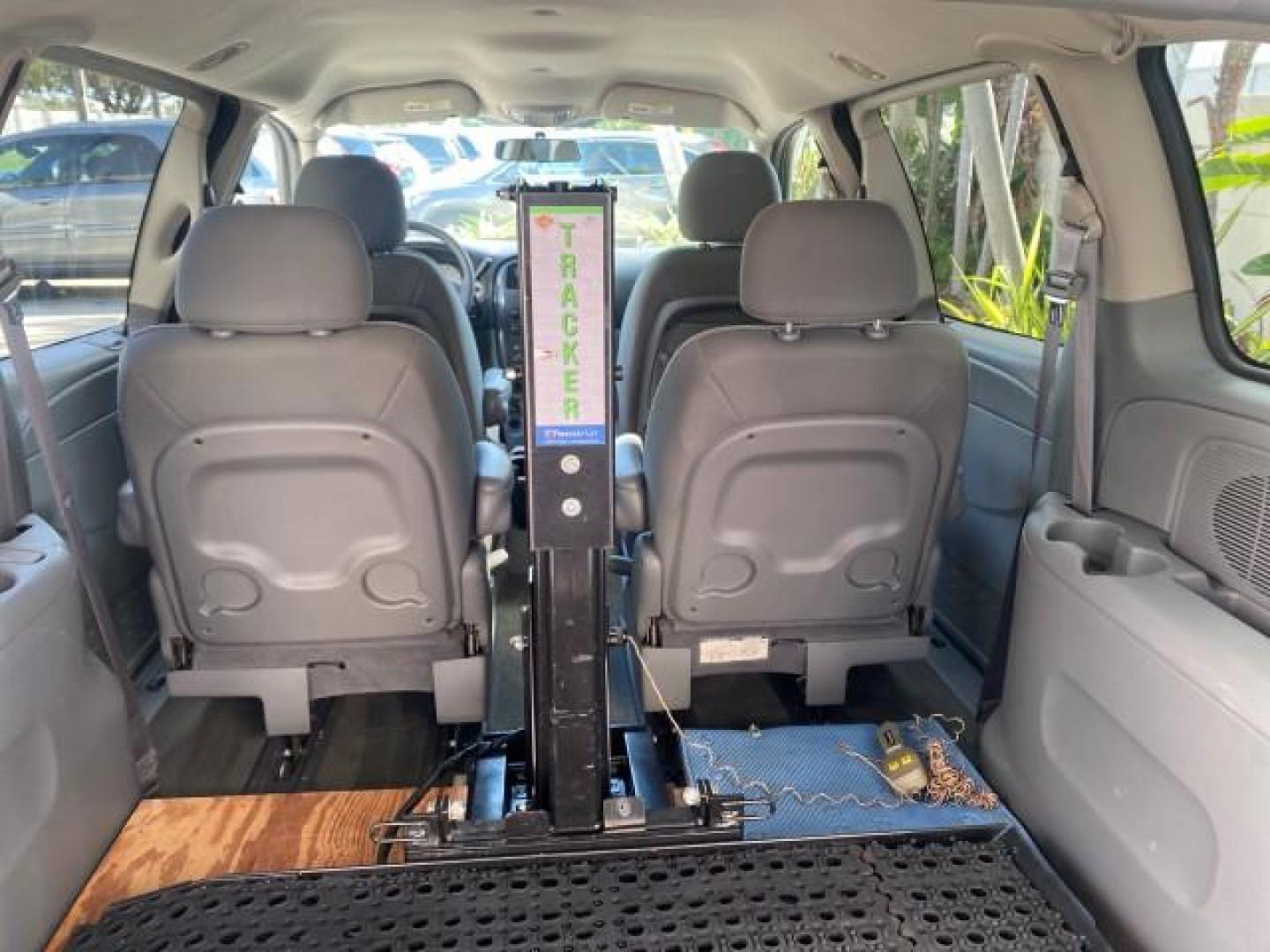 2006 Stone White /Medium Slate Gray Dodge Caravan SXT LOW MILES 28,367 1 OWNER HANDICAP LIFT (1D4GP45R96B) with an 3.3L OHV V6 Engine engine, Automatic transmission, located at 4701 North Dixie Hwy, Pompano Beach, FL, 33064, (954) 422-2889, 26.240938, -80.123474 - OUR WEBPAGE FLORIDACARS1.COM HAS OVER 100 PHOTOS AND FREE CARFAX LINK 2006 DODGE CARAVAN SXT 1 OWNER FREEDOM HANDICAP LIFT/SCOOTER VIN: 1D4GP45R96B730062 1 D 4 G P 4 5 R 9 6 B 7 3 0 0 6 2 VAN 3.3L V6 F OHV GASOLINE 26 MPG FRONT WHEEL DRIVE Features Air Conditioning Alloy Wheels AM/FM Stereo Automati- Photo#90