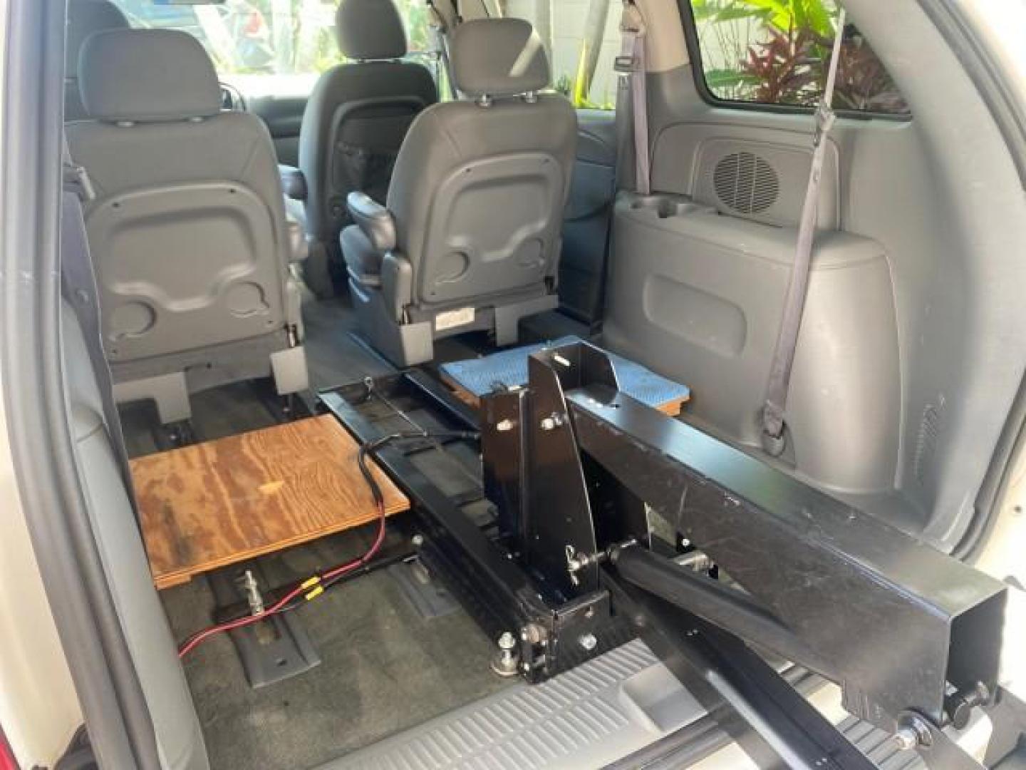 2006 Stone White /Medium Slate Gray Dodge Caravan SXT LOW MILES 28,367 1 OWNER HANDICAP LIFT (1D4GP45R96B) with an 3.3L OHV V6 Engine engine, Automatic transmission, located at 4701 North Dixie Hwy, Pompano Beach, FL, 33064, (954) 422-2889, 26.240938, -80.123474 - OUR WEBPAGE FLORIDACARS1.COM HAS OVER 100 PHOTOS AND FREE CARFAX LINK 2006 DODGE CARAVAN SXT 1 OWNER FREEDOM HANDICAP LIFT/SCOOTER VIN: 1D4GP45R96B730062 1 D 4 G P 4 5 R 9 6 B 7 3 0 0 6 2 VAN 3.3L V6 F OHV GASOLINE 26 MPG FRONT WHEEL DRIVE Features Air Conditioning Alloy Wheels AM/FM Stereo Automati- Photo#99