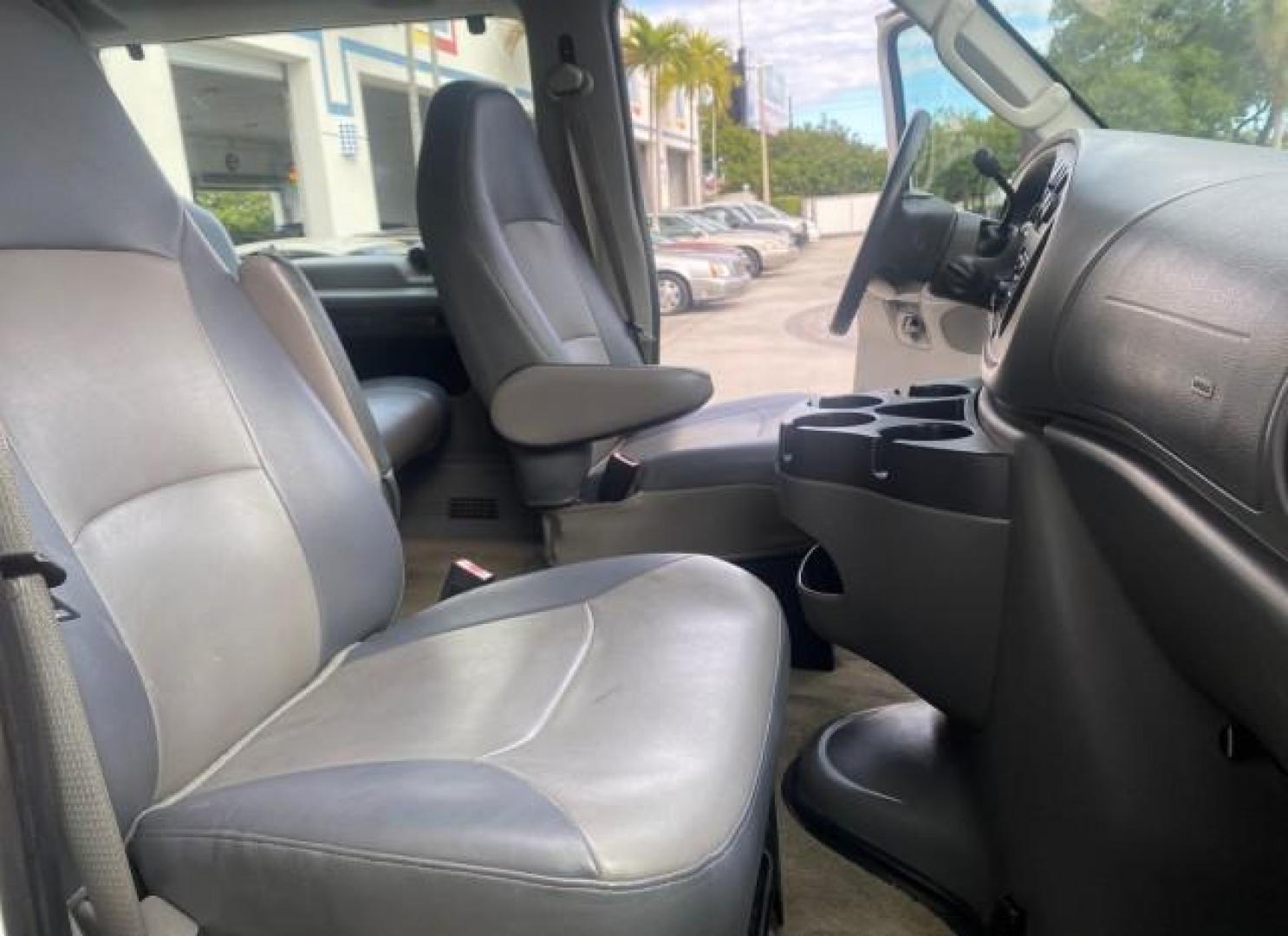2008 Oxford White /Medium Flint Ford Econoline Wagon XLT 15 PASSENGERS E350 CLEAN (1FBSS31L78D) with an 5.4L EFI V8 Engine engine, Automatic transmission, located at 4701 North Dixie Hwy, Pompano Beach, FL, 33064, (954) 422-2889, 26.240938, -80.123474 - OUR WEBPAGE FLORIDACARS1.COM HAS OVER 100 PHOTOS AND FREE CARFAX LINK 2008 FORD E-SERIES E-350 SD XLT 15 PASSENGER VIN: 1FBSS31L78DA45023 1 F B S S 3 1 L 7 8 D A 4 5 0 2 3 VAN 5.4L V8 F SOHC 16V GASOLINE REAR WHEEL DRIVE Features ABS Brakes Air Conditioning AM/FM Stereo Automatic Transmission Barn D- Photo#12