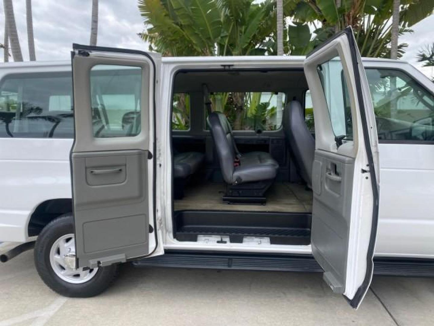2008 Oxford White /Medium Flint Ford Econoline Wagon XLT 15 PASSENGERS E350 CLEAN (1FBSS31L78D) with an 5.4L EFI V8 Engine engine, Automatic transmission, located at 4701 North Dixie Hwy, Pompano Beach, FL, 33064, (954) 422-2889, 26.240938, -80.123474 - OUR WEBPAGE FLORIDACARS1.COM HAS OVER 100 PHOTOS AND FREE CARFAX LINK 2008 FORD E-SERIES E-350 SD XLT 15 PASSENGER VIN: 1FBSS31L78DA45023 1 F B S S 3 1 L 7 8 D A 4 5 0 2 3 VAN 5.4L V8 F SOHC 16V GASOLINE REAR WHEEL DRIVE Features ABS Brakes Air Conditioning AM/FM Stereo Automatic Transmission Barn D- Photo#13