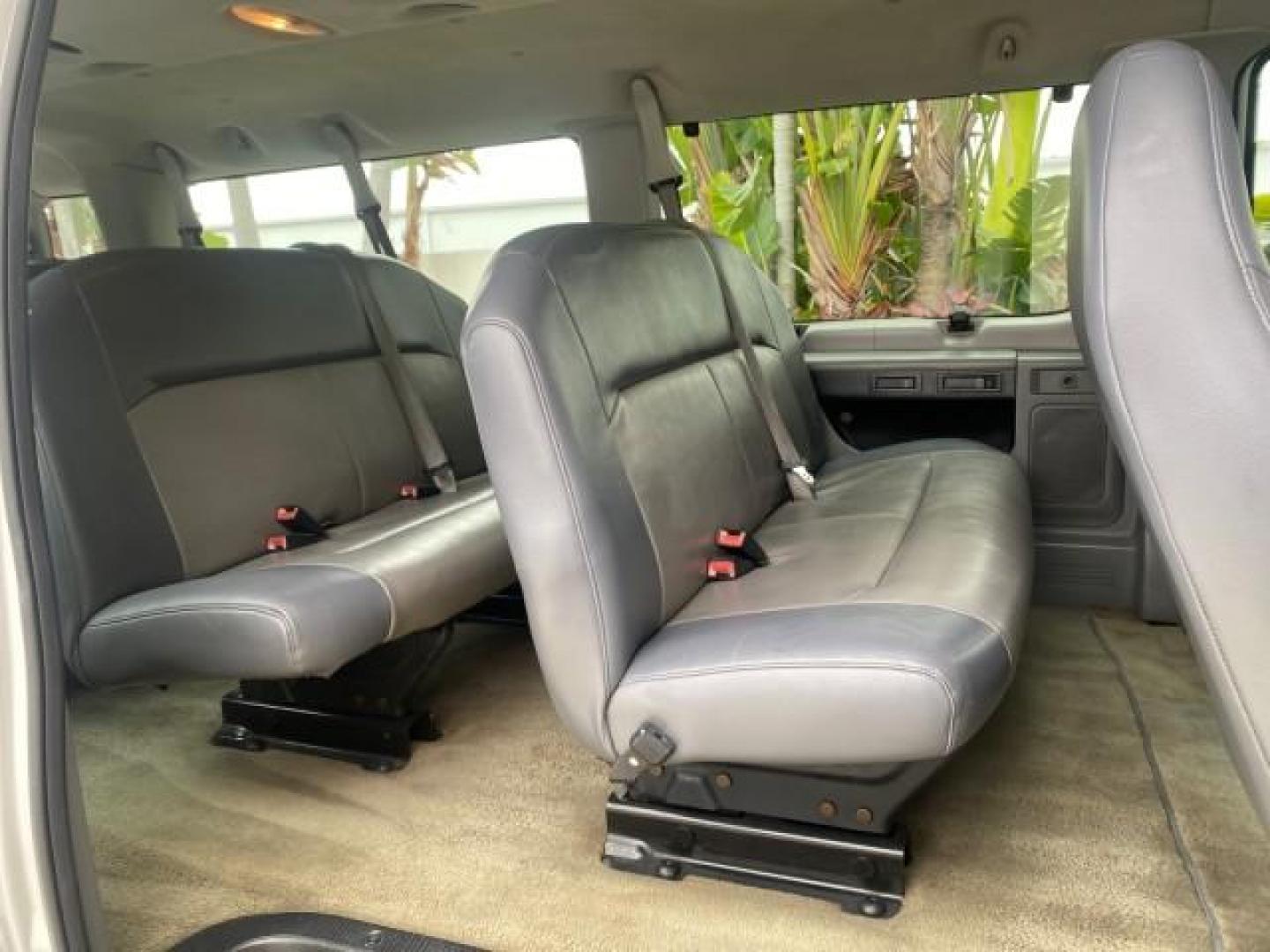 2008 Oxford White /Medium Flint Ford Econoline Wagon XLT 15 PASSENGERS E350 CLEAN (1FBSS31L78D) with an 5.4L EFI V8 Engine engine, Automatic transmission, located at 4701 North Dixie Hwy, Pompano Beach, FL, 33064, (954) 422-2889, 26.240938, -80.123474 - OUR WEBPAGE FLORIDACARS1.COM HAS OVER 100 PHOTOS AND FREE CARFAX LINK 2008 FORD E-SERIES E-350 SD XLT 15 PASSENGER VIN: 1FBSS31L78DA45023 1 F B S S 3 1 L 7 8 D A 4 5 0 2 3 VAN 5.4L V8 F SOHC 16V GASOLINE REAR WHEEL DRIVE Features ABS Brakes Air Conditioning AM/FM Stereo Automatic Transmission Barn D- Photo#14