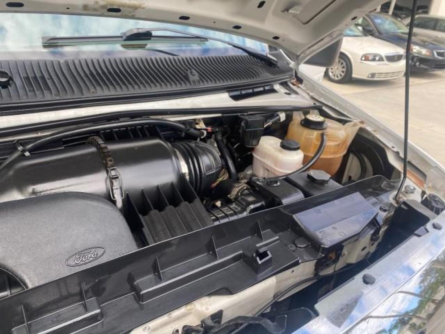 2008 Oxford White /Medium Flint Ford Econoline Wagon XLT 15 PASSENGERS E350 CLEAN (1FBSS31L78D) with an 5.4L EFI V8 Engine engine, Automatic transmission, located at 4701 North Dixie Hwy, Pompano Beach, FL, 33064, (954) 422-2889, 26.240938, -80.123474 - OUR WEBPAGE FLORIDACARS1.COM HAS OVER 100 PHOTOS AND FREE CARFAX LINK 2008 FORD E-SERIES E-350 SD XLT 15 PASSENGER VIN: 1FBSS31L78DA45023 1 F B S S 3 1 L 7 8 D A 4 5 0 2 3 VAN 5.4L V8 F SOHC 16V GASOLINE REAR WHEEL DRIVE Features ABS Brakes Air Conditioning AM/FM Stereo Automatic Transmission Barn D- Photo#25