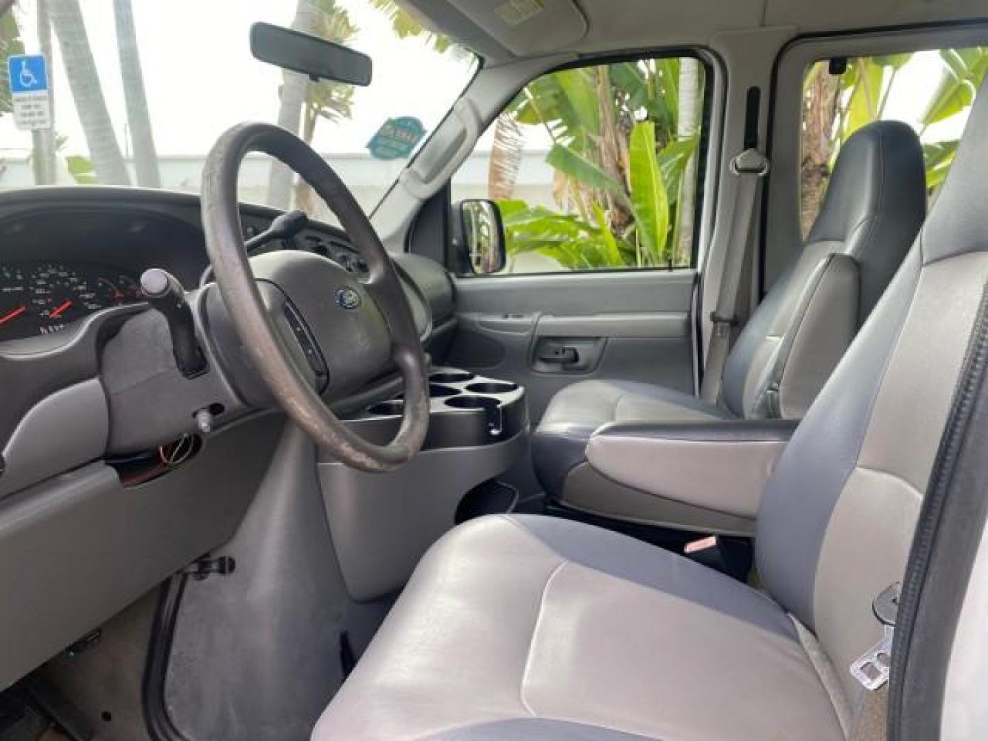 2008 Oxford White /Medium Flint Ford Econoline Wagon XLT 15 PASSENGERS E350 CLEAN (1FBSS31L78D) with an 5.4L EFI V8 Engine engine, Automatic transmission, located at 4701 North Dixie Hwy, Pompano Beach, FL, 33064, (954) 422-2889, 26.240938, -80.123474 - OUR WEBPAGE FLORIDACARS1.COM HAS OVER 100 PHOTOS AND FREE CARFAX LINK 2008 FORD E-SERIES E-350 SD XLT 15 PASSENGER VIN: 1FBSS31L78DA45023 1 F B S S 3 1 L 7 8 D A 4 5 0 2 3 VAN 5.4L V8 F SOHC 16V GASOLINE REAR WHEEL DRIVE Features ABS Brakes Air Conditioning AM/FM Stereo Automatic Transmission Barn D- Photo#45