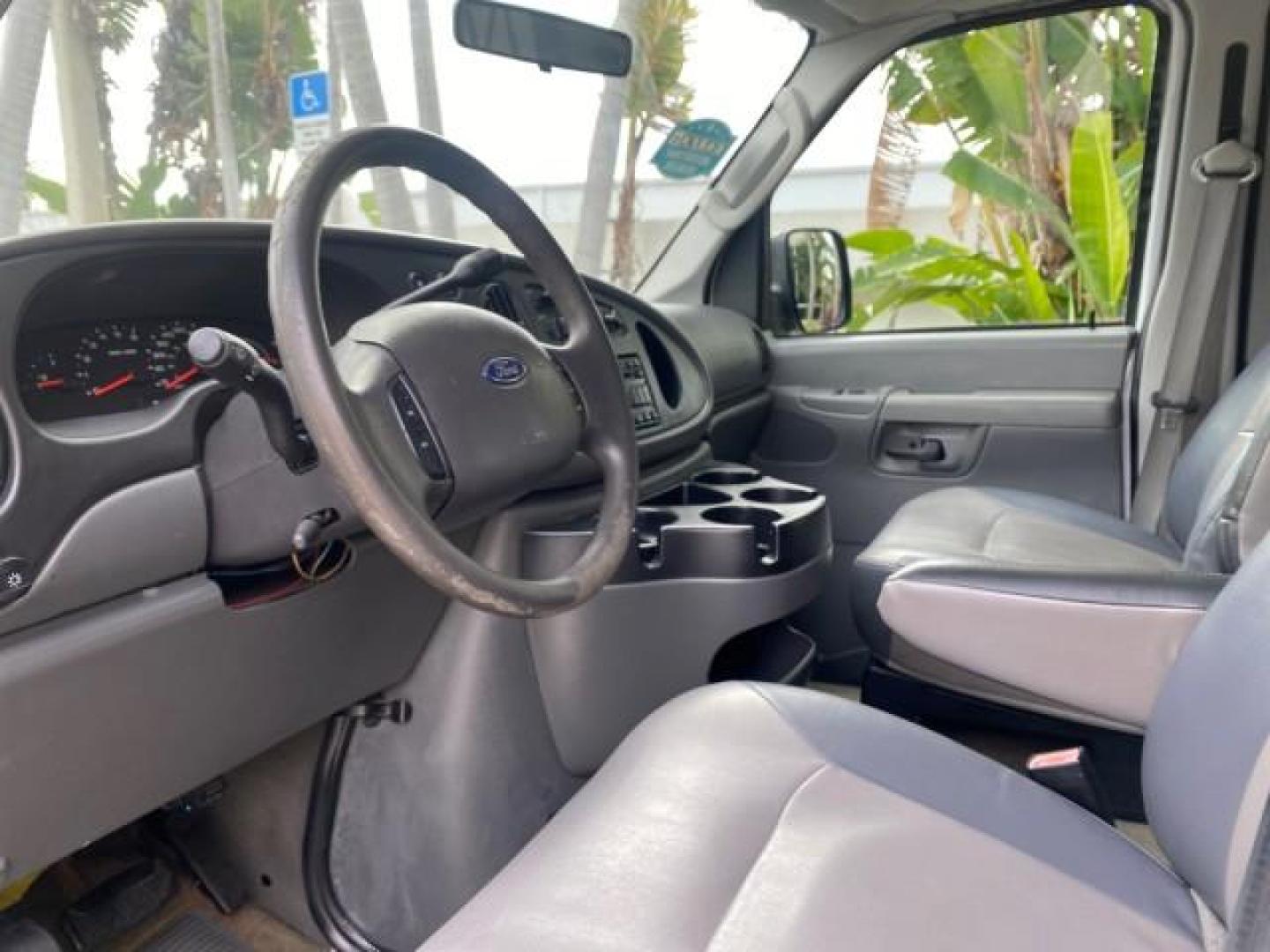 2008 Oxford White /Medium Flint Ford Econoline Wagon XLT 15 PASSENGERS E350 CLEAN (1FBSS31L78D) with an 5.4L EFI V8 Engine engine, Automatic transmission, located at 4701 North Dixie Hwy, Pompano Beach, FL, 33064, (954) 422-2889, 26.240938, -80.123474 - OUR WEBPAGE FLORIDACARS1.COM HAS OVER 100 PHOTOS AND FREE CARFAX LINK 2008 FORD E-SERIES E-350 SD XLT 15 PASSENGER VIN: 1FBSS31L78DA45023 1 F B S S 3 1 L 7 8 D A 4 5 0 2 3 VAN 5.4L V8 F SOHC 16V GASOLINE REAR WHEEL DRIVE Features ABS Brakes Air Conditioning AM/FM Stereo Automatic Transmission Barn D- Photo#46