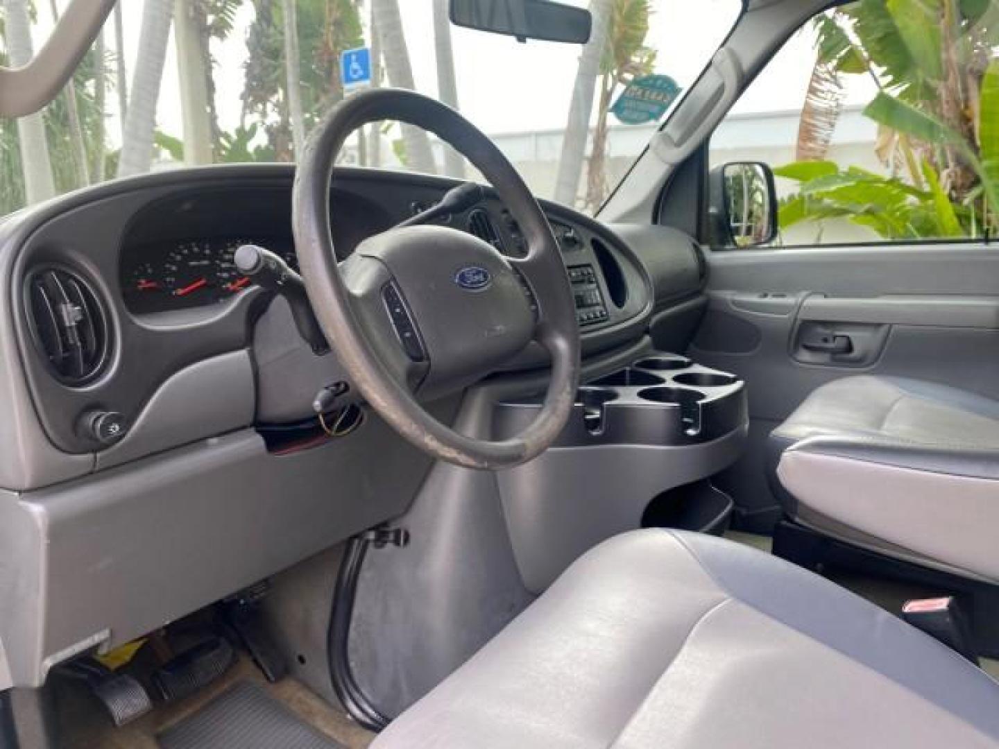 2008 Oxford White /Medium Flint Ford Econoline Wagon XLT 15 PASSENGERS E350 CLEAN (1FBSS31L78D) with an 5.4L EFI V8 Engine engine, Automatic transmission, located at 4701 North Dixie Hwy, Pompano Beach, FL, 33064, (954) 422-2889, 26.240938, -80.123474 - OUR WEBPAGE FLORIDACARS1.COM HAS OVER 100 PHOTOS AND FREE CARFAX LINK 2008 FORD E-SERIES E-350 SD XLT 15 PASSENGER VIN: 1FBSS31L78DA45023 1 F B S S 3 1 L 7 8 D A 4 5 0 2 3 VAN 5.4L V8 F SOHC 16V GASOLINE REAR WHEEL DRIVE Features ABS Brakes Air Conditioning AM/FM Stereo Automatic Transmission Barn D- Photo#47