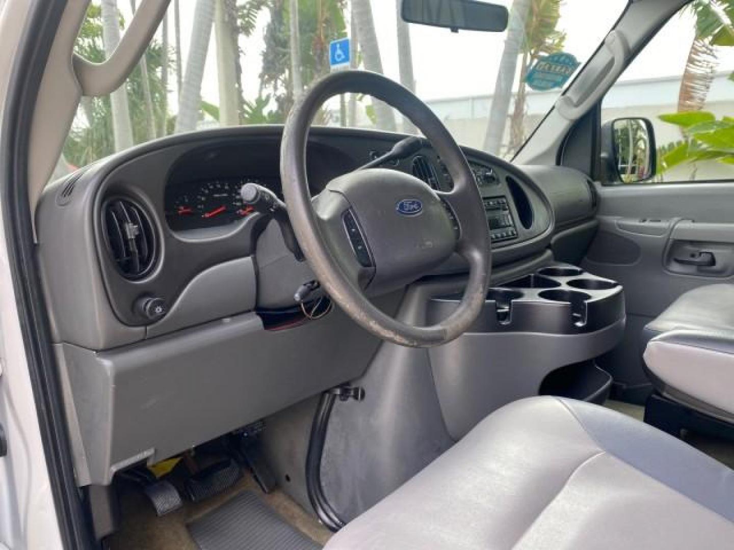 2008 Oxford White /Medium Flint Ford Econoline Wagon XLT 15 PASSENGERS E350 CLEAN (1FBSS31L78D) with an 5.4L EFI V8 Engine engine, Automatic transmission, located at 4701 North Dixie Hwy, Pompano Beach, FL, 33064, (954) 422-2889, 26.240938, -80.123474 - OUR WEBPAGE FLORIDACARS1.COM HAS OVER 100 PHOTOS AND FREE CARFAX LINK 2008 FORD E-SERIES E-350 SD XLT 15 PASSENGER VIN: 1FBSS31L78DA45023 1 F B S S 3 1 L 7 8 D A 4 5 0 2 3 VAN 5.4L V8 F SOHC 16V GASOLINE REAR WHEEL DRIVE Features ABS Brakes Air Conditioning AM/FM Stereo Automatic Transmission Barn D- Photo#48