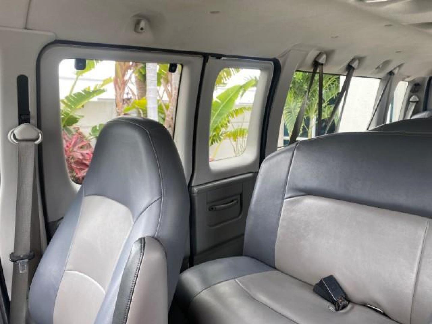2008 Oxford White /Medium Flint Ford Econoline Wagon XLT 15 PASSENGERS E350 CLEAN (1FBSS31L78D) with an 5.4L EFI V8 Engine engine, Automatic transmission, located at 4701 North Dixie Hwy, Pompano Beach, FL, 33064, (954) 422-2889, 26.240938, -80.123474 - OUR WEBPAGE FLORIDACARS1.COM HAS OVER 100 PHOTOS AND FREE CARFAX LINK 2008 FORD E-SERIES E-350 SD XLT 15 PASSENGER VIN: 1FBSS31L78DA45023 1 F B S S 3 1 L 7 8 D A 4 5 0 2 3 VAN 5.4L V8 F SOHC 16V GASOLINE REAR WHEEL DRIVE Features ABS Brakes Air Conditioning AM/FM Stereo Automatic Transmission Barn D- Photo#66