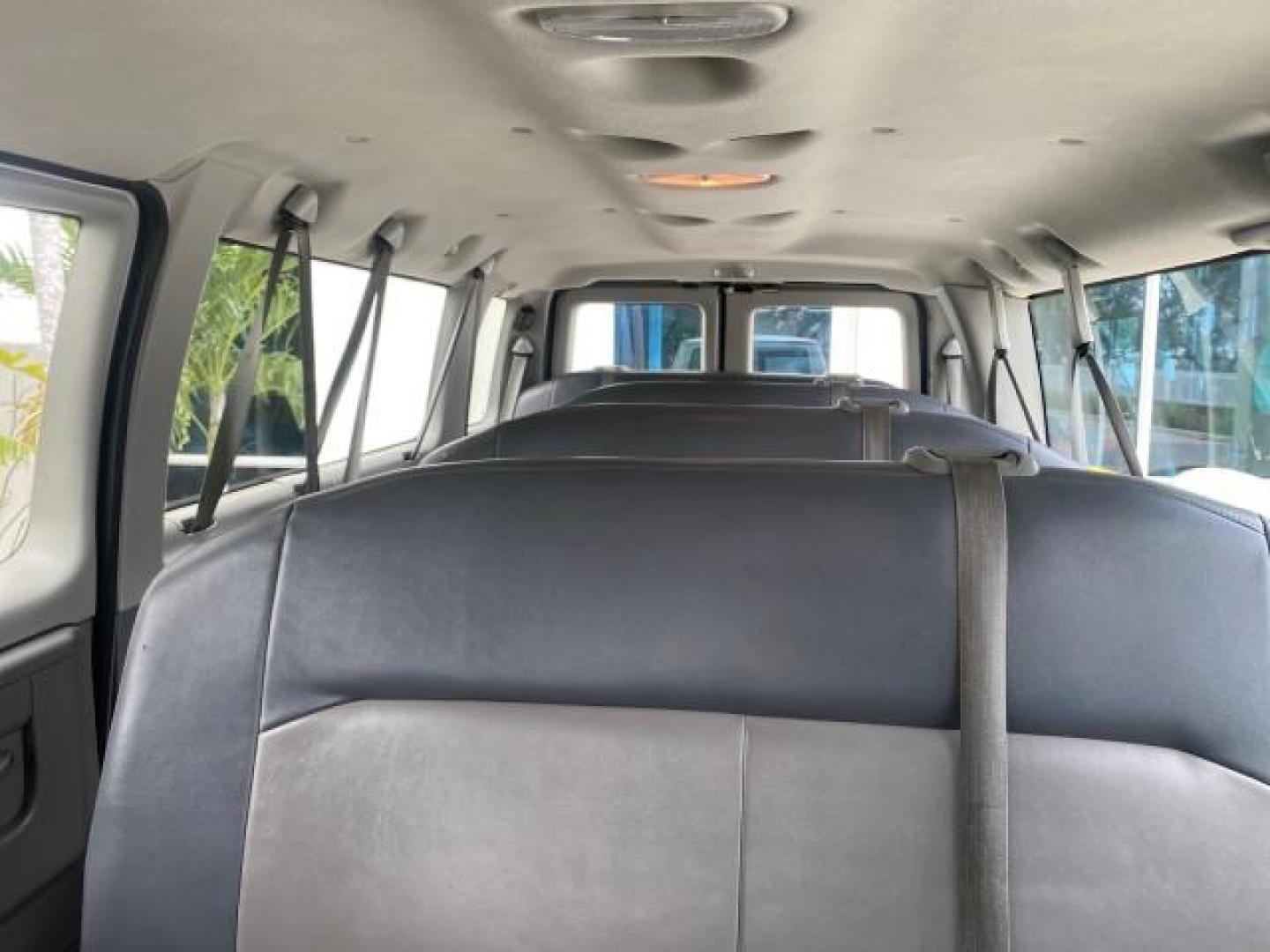 2008 Oxford White /Medium Flint Ford Econoline Wagon XLT 15 PASSENGERS E350 CLEAN (1FBSS31L78D) with an 5.4L EFI V8 Engine engine, Automatic transmission, located at 4701 North Dixie Hwy, Pompano Beach, FL, 33064, (954) 422-2889, 26.240938, -80.123474 - OUR WEBPAGE FLORIDACARS1.COM HAS OVER 100 PHOTOS AND FREE CARFAX LINK 2008 FORD E-SERIES E-350 SD XLT 15 PASSENGER VIN: 1FBSS31L78DA45023 1 F B S S 3 1 L 7 8 D A 4 5 0 2 3 VAN 5.4L V8 F SOHC 16V GASOLINE REAR WHEEL DRIVE Features ABS Brakes Air Conditioning AM/FM Stereo Automatic Transmission Barn D- Photo#68