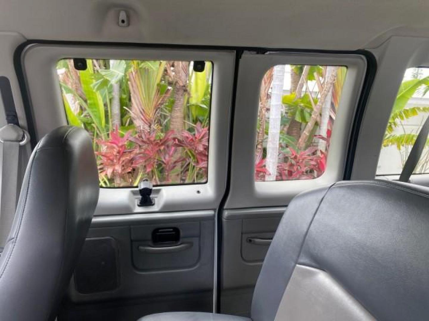 2008 Oxford White /Medium Flint Ford Econoline Wagon XLT 15 PASSENGERS E350 CLEAN (1FBSS31L78D) with an 5.4L EFI V8 Engine engine, Automatic transmission, located at 4701 North Dixie Hwy, Pompano Beach, FL, 33064, (954) 422-2889, 26.240938, -80.123474 - OUR WEBPAGE FLORIDACARS1.COM HAS OVER 100 PHOTOS AND FREE CARFAX LINK 2008 FORD E-SERIES E-350 SD XLT 15 PASSENGER VIN: 1FBSS31L78DA45023 1 F B S S 3 1 L 7 8 D A 4 5 0 2 3 VAN 5.4L V8 F SOHC 16V GASOLINE REAR WHEEL DRIVE Features ABS Brakes Air Conditioning AM/FM Stereo Automatic Transmission Barn D- Photo#75