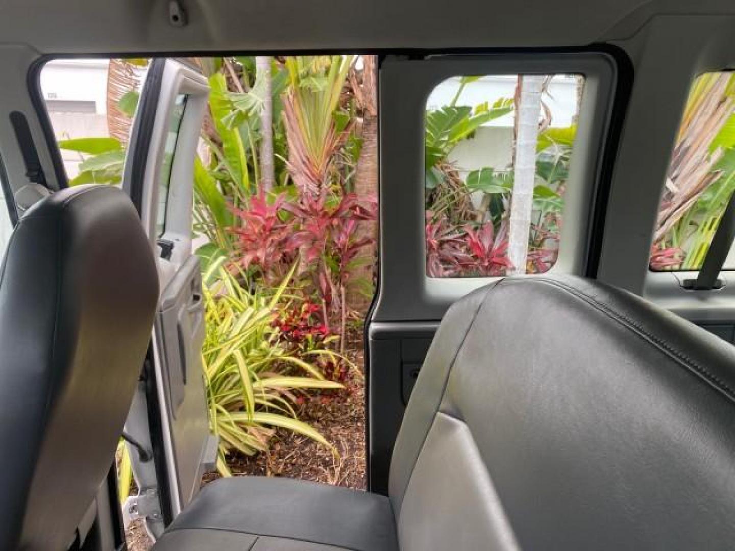 2008 Oxford White /Medium Flint Ford Econoline Wagon XLT 15 PASSENGERS E350 CLEAN (1FBSS31L78D) with an 5.4L EFI V8 Engine engine, Automatic transmission, located at 4701 North Dixie Hwy, Pompano Beach, FL, 33064, (954) 422-2889, 26.240938, -80.123474 - OUR WEBPAGE FLORIDACARS1.COM HAS OVER 100 PHOTOS AND FREE CARFAX LINK 2008 FORD E-SERIES E-350 SD XLT 15 PASSENGER VIN: 1FBSS31L78DA45023 1 F B S S 3 1 L 7 8 D A 4 5 0 2 3 VAN 5.4L V8 F SOHC 16V GASOLINE REAR WHEEL DRIVE Features ABS Brakes Air Conditioning AM/FM Stereo Automatic Transmission Barn D- Photo#81