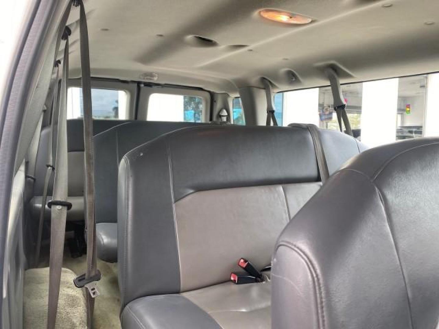 2008 Oxford White /Medium Flint Ford Econoline Wagon XLT 15 PASSENGERS E350 CLEAN (1FBSS31L78D) with an 5.4L EFI V8 Engine engine, Automatic transmission, located at 4701 North Dixie Hwy, Pompano Beach, FL, 33064, (954) 422-2889, 26.240938, -80.123474 - OUR WEBPAGE FLORIDACARS1.COM HAS OVER 100 PHOTOS AND FREE CARFAX LINK 2008 FORD E-SERIES E-350 SD XLT 15 PASSENGER VIN: 1FBSS31L78DA45023 1 F B S S 3 1 L 7 8 D A 4 5 0 2 3 VAN 5.4L V8 F SOHC 16V GASOLINE REAR WHEEL DRIVE Features ABS Brakes Air Conditioning AM/FM Stereo Automatic Transmission Barn D- Photo#89