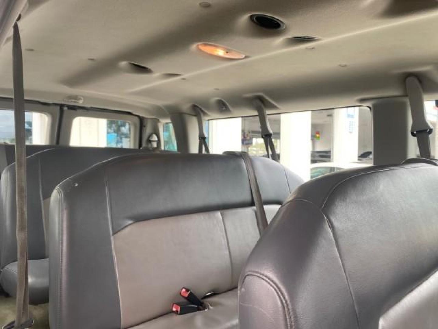 2008 Oxford White /Medium Flint Ford Econoline Wagon XLT 15 PASSENGERS E350 CLEAN (1FBSS31L78D) with an 5.4L EFI V8 Engine engine, Automatic transmission, located at 4701 North Dixie Hwy, Pompano Beach, FL, 33064, (954) 422-2889, 26.240938, -80.123474 - OUR WEBPAGE FLORIDACARS1.COM HAS OVER 100 PHOTOS AND FREE CARFAX LINK 2008 FORD E-SERIES E-350 SD XLT 15 PASSENGER VIN: 1FBSS31L78DA45023 1 F B S S 3 1 L 7 8 D A 4 5 0 2 3 VAN 5.4L V8 F SOHC 16V GASOLINE REAR WHEEL DRIVE Features ABS Brakes Air Conditioning AM/FM Stereo Automatic Transmission Barn D- Photo#90