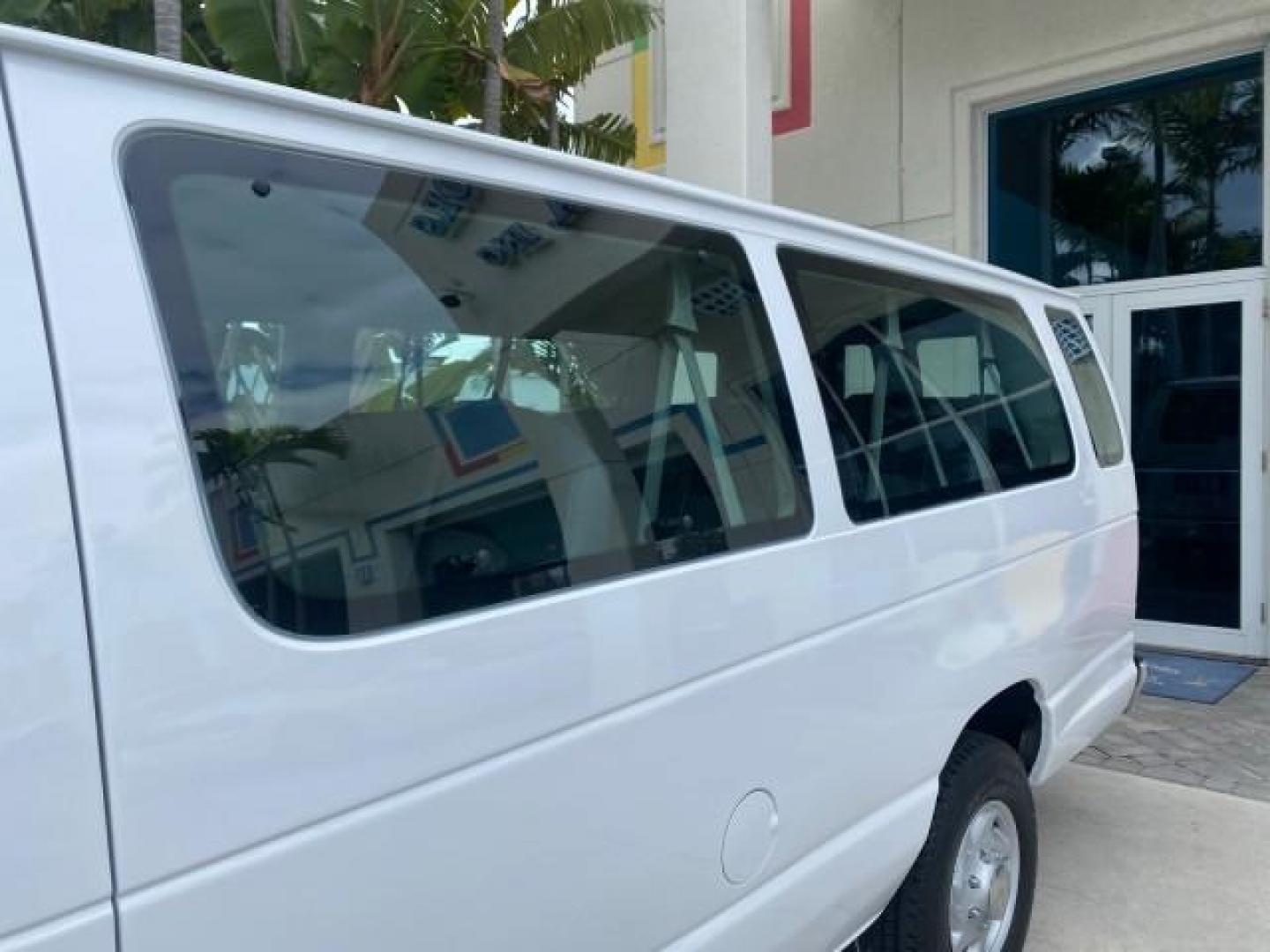 2008 Oxford White /Medium Flint Ford Econoline Wagon XLT 15 PASSENGERS E350 CLEAN (1FBSS31L78D) with an 5.4L EFI V8 Engine engine, Automatic transmission, located at 4701 North Dixie Hwy, Pompano Beach, FL, 33064, (954) 422-2889, 26.240938, -80.123474 - OUR WEBPAGE FLORIDACARS1.COM HAS OVER 100 PHOTOS AND FREE CARFAX LINK 2008 FORD E-SERIES E-350 SD XLT 15 PASSENGER VIN: 1FBSS31L78DA45023 1 F B S S 3 1 L 7 8 D A 4 5 0 2 3 VAN 5.4L V8 F SOHC 16V GASOLINE REAR WHEEL DRIVE Features ABS Brakes Air Conditioning AM/FM Stereo Automatic Transmission Barn D- Photo#94