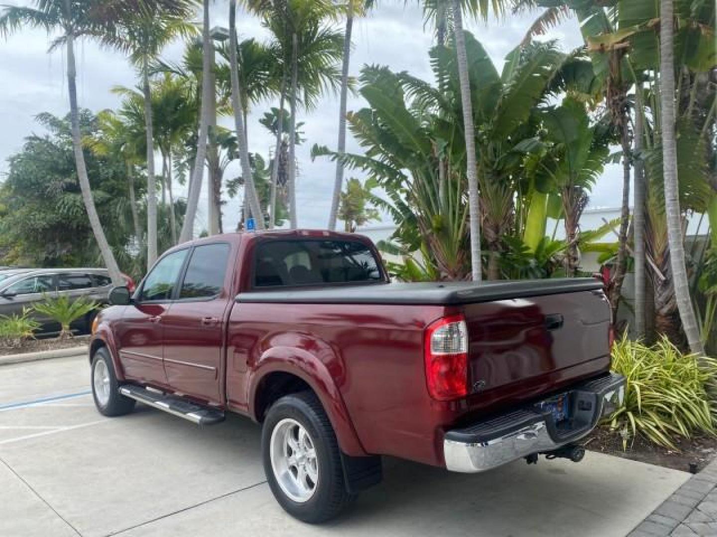 2006 Salsa Red Pearl /Taupe Toyota Tundra SR5 4 DR CREW LOW MILES 93,838 (5TBET34156S) with an 4.7L DOHC SEFI 32-Valve i-Force V8 Engine engine, Automatic transmission, located at 4701 North Dixie Hwy, Pompano Beach, FL, 33064, (954) 422-2889, 26.240938, -80.123474 - OUR WEBPAGE FLORIDACARS1.COM HAS OVER 100 PHOTOS AND FREE CARFAX LINK 2006 TOYOTA TUNDRA SR5 X-SP RACING APPERANCE PCKG - VERY HARD TO FIND IN LEATHER VIN: 5TBET34156S560824 5 T B E T 3 4 1 5 6 S 5 6 0 8 2 4 4 DOOR EXTENDED CAB PICKUP 4.7L V8 F DOHC 32V GASOLINE 19 MPG REAR WHEEL DRIVE Features 20 I - Photo#5