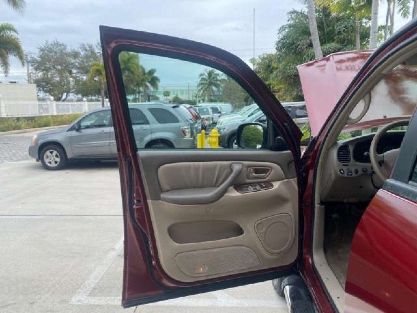 2006 Salsa Red Pearl /Taupe Toyota Tundra SR5 4 DR CREW LOW MILES 93,838 (5TBET34156S) with an 4.7L DOHC SEFI 32-Valve i-Force V8 Engine engine, Automatic transmission, located at 4701 North Dixie Hwy, Pompano Beach, FL, 33064, (954) 422-2889, 26.240938, -80.123474 - OUR WEBPAGE FLORIDACARS1.COM HAS OVER 100 PHOTOS AND FREE CARFAX LINK 2006 TOYOTA TUNDRA SR5 X-SP RACING APPERANCE PCKG - VERY HARD TO FIND IN LEATHER VIN: 5TBET34156S560824 5 T B E T 3 4 1 5 6 S 5 6 0 8 2 4 4 DOOR EXTENDED CAB PICKUP 4.7L V8 F DOHC 32V GASOLINE 19 MPG REAR WHEEL DRIVE Features 20 I - Photo#9