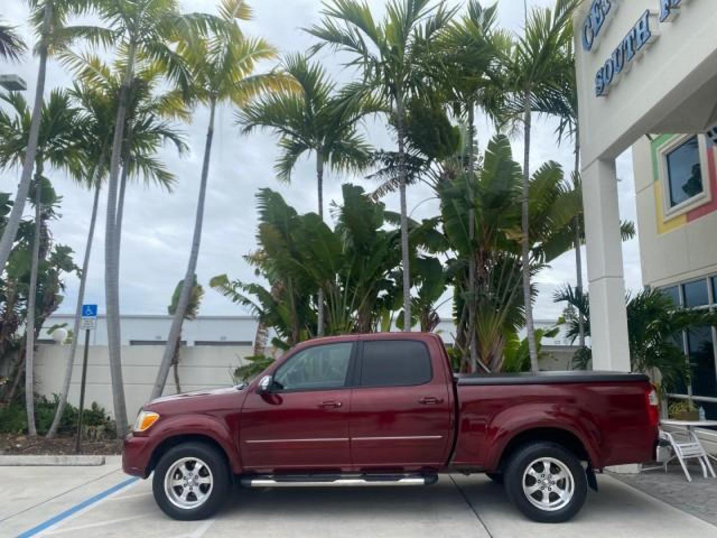 2006 Salsa Red Pearl /Taupe Toyota Tundra SR5 4 DR CREW LOW MILES 93,838 (5TBET34156S) with an 4.7L DOHC SEFI 32-Valve i-Force V8 Engine engine, Automatic transmission, located at 4701 North Dixie Hwy, Pompano Beach, FL, 33064, (954) 422-2889, 26.240938, -80.123474 - OUR WEBPAGE FLORIDACARS1.COM HAS OVER 100 PHOTOS AND FREE CARFAX LINK 2006 TOYOTA TUNDRA SR5 X-SP RACING APPERANCE PCKG - VERY HARD TO FIND IN LEATHER VIN: 5TBET34156S560824 5 T B E T 3 4 1 5 6 S 5 6 0 8 2 4 4 DOOR EXTENDED CAB PICKUP 4.7L V8 F DOHC 32V GASOLINE 19 MPG REAR WHEEL DRIVE Features 20 I - Photo#30