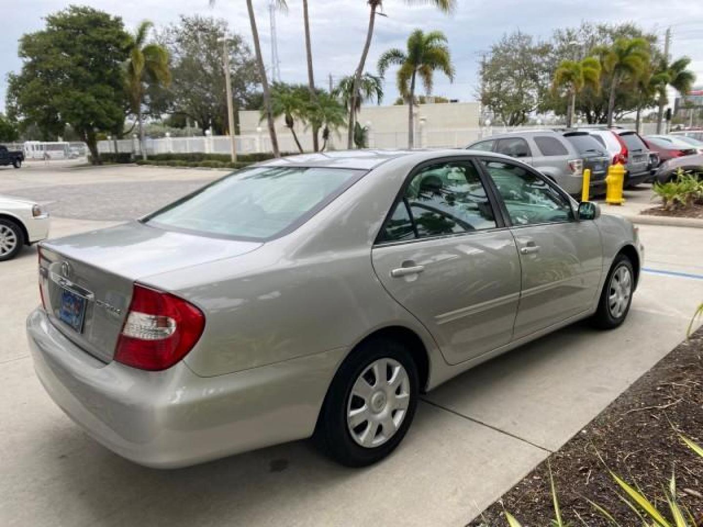 2002 Desert Sand Mica /Stone Toyota Camry LE 4CYL LOW MILES 43,045 1 OWNER (4T1BE32K72U) with an 2.4L Twin-Cam EFI 16-Valve 4-Cyl Engine engine, Automatic transmission, located at 4701 North Dixie Hwy, Pompano Beach, FL, 33064, (954) 422-2889, 26.240938, -80.123474 - OUR WEBPAGE FLORIDACARS1.COM HAS OVER 100 PHOTOS AND FREE CARFAX LINK 2002 TOYOTA CAMRY LE 1 OWNER NORTH CAROLINA RETIREE 40 SERVICES PAMPERED VIN: 4T1BE32K72U051836 4 T 1 B E 3 2 K 7 2 U 0 5 1 8 3 6 SEDAN 4 DR 2.4L I4 F DOHC 16V GASOLINE 32 MPG GREAT COMMUTER CAR VERY DEPENDABLE FRONT WHEEL DRIVE F - Photo#7