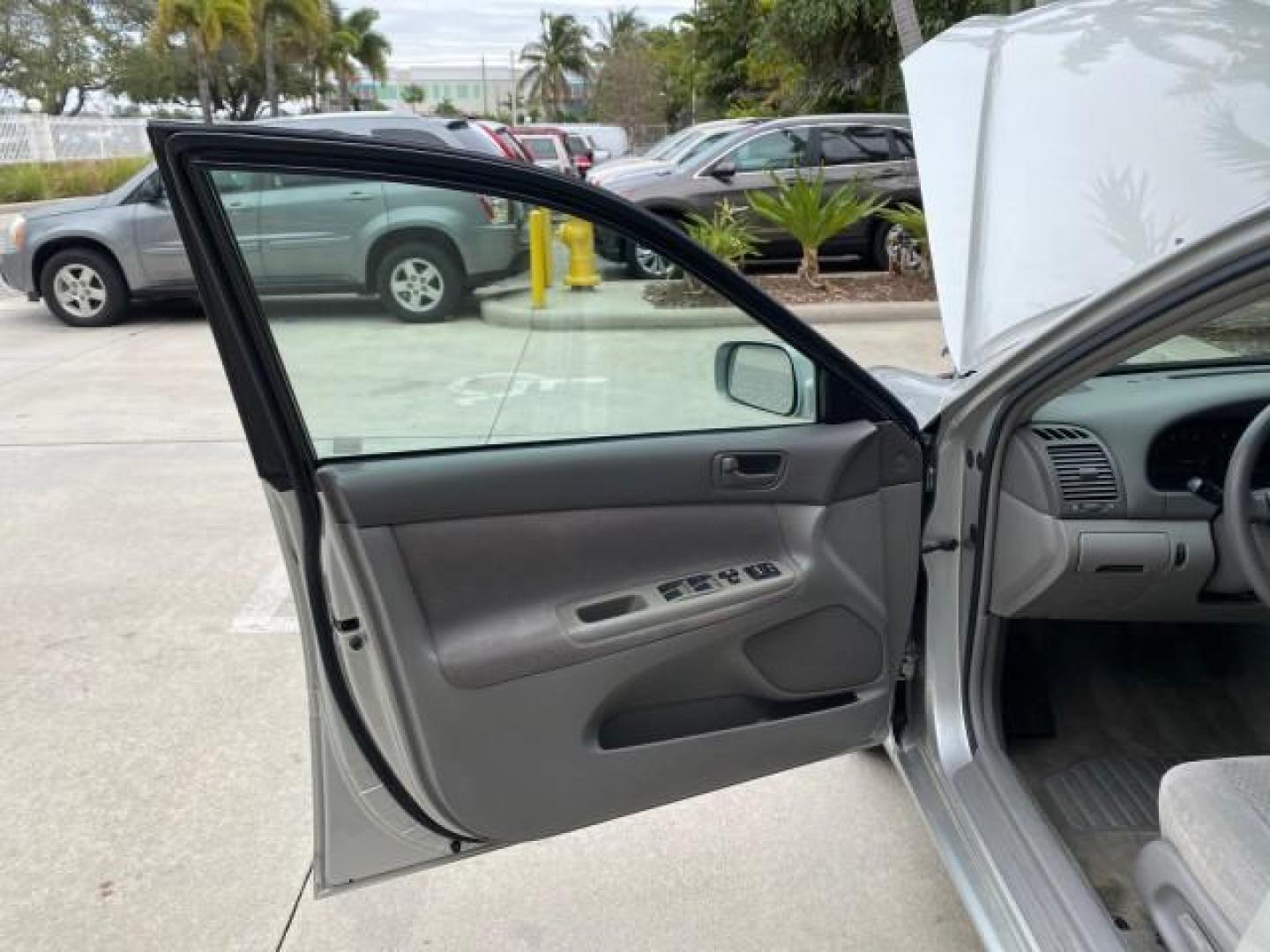 2002 Desert Sand Mica /Stone Toyota Camry LE 4CYL LOW MILES 43,045 1 OWNER (4T1BE32K72U) with an 2.4L Twin-Cam EFI 16-Valve 4-Cyl Engine engine, Automatic transmission, located at 4701 North Dixie Hwy, Pompano Beach, FL, 33064, (954) 422-2889, 26.240938, -80.123474 - OUR WEBPAGE FLORIDACARS1.COM HAS OVER 100 PHOTOS AND FREE CARFAX LINK 2002 TOYOTA CAMRY LE 1 OWNER NORTH CAROLINA RETIREE 40 SERVICES PAMPERED VIN: 4T1BE32K72U051836 4 T 1 B E 3 2 K 7 2 U 0 5 1 8 3 6 SEDAN 4 DR 2.4L I4 F DOHC 16V GASOLINE 32 MPG GREAT COMMUTER CAR VERY DEPENDABLE FRONT WHEEL DRIVE F - Photo#9