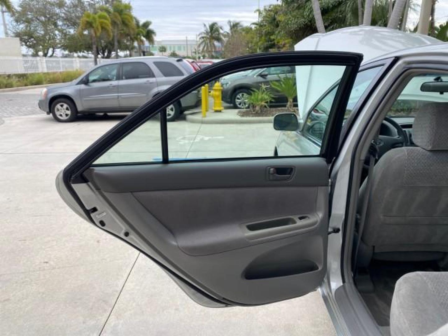 2002 Desert Sand Mica /Stone Toyota Camry LE 4CYL LOW MILES 43,045 1 OWNER (4T1BE32K72U) with an 2.4L Twin-Cam EFI 16-Valve 4-Cyl Engine engine, Automatic transmission, located at 4701 North Dixie Hwy, Pompano Beach, FL, 33064, (954) 422-2889, 26.240938, -80.123474 - OUR WEBPAGE FLORIDACARS1.COM HAS OVER 100 PHOTOS AND FREE CARFAX LINK 2002 TOYOTA CAMRY LE 1 OWNER NORTH CAROLINA RETIREE 40 SERVICES PAMPERED VIN: 4T1BE32K72U051836 4 T 1 B E 3 2 K 7 2 U 0 5 1 8 3 6 SEDAN 4 DR 2.4L I4 F DOHC 16V GASOLINE 32 MPG GREAT COMMUTER CAR VERY DEPENDABLE FRONT WHEEL DRIVE F - Photo#13