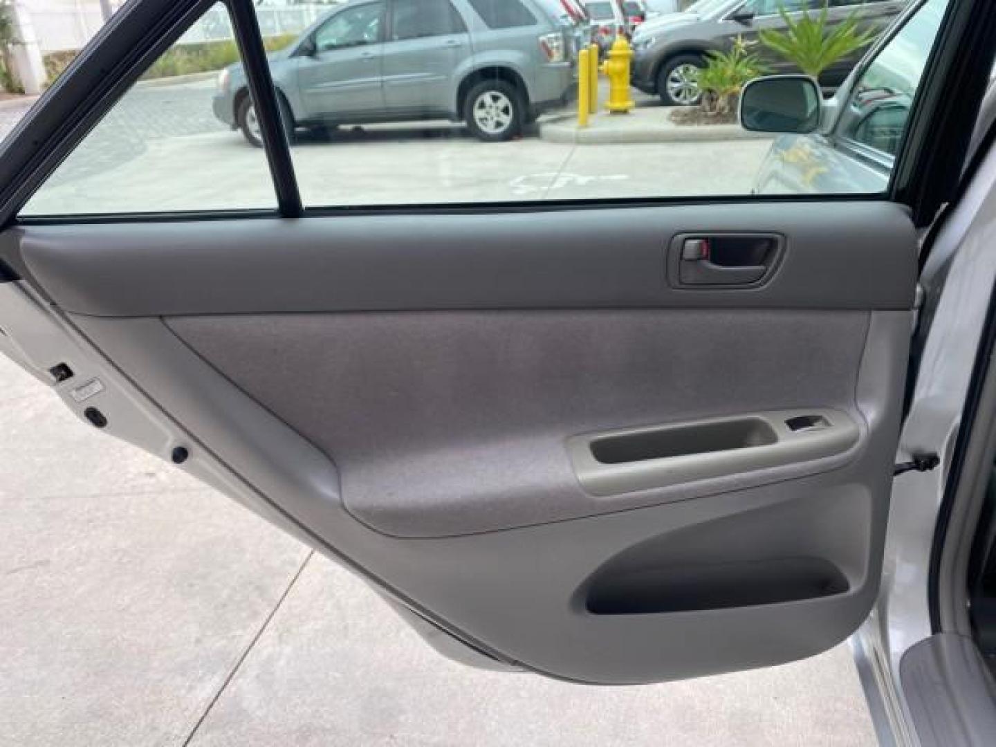 2002 Desert Sand Mica /Stone Toyota Camry LE 4CYL LOW MILES 43,045 1 OWNER (4T1BE32K72U) with an 2.4L Twin-Cam EFI 16-Valve 4-Cyl Engine engine, Automatic transmission, located at 4701 North Dixie Hwy, Pompano Beach, FL, 33064, (954) 422-2889, 26.240938, -80.123474 - OUR WEBPAGE FLORIDACARS1.COM HAS OVER 100 PHOTOS AND FREE CARFAX LINK 2002 TOYOTA CAMRY LE 1 OWNER NORTH CAROLINA RETIREE 40 SERVICES PAMPERED VIN: 4T1BE32K72U051836 4 T 1 B E 3 2 K 7 2 U 0 5 1 8 3 6 SEDAN 4 DR 2.4L I4 F DOHC 16V GASOLINE 32 MPG GREAT COMMUTER CAR VERY DEPENDABLE FRONT WHEEL DRIVE F - Photo#70