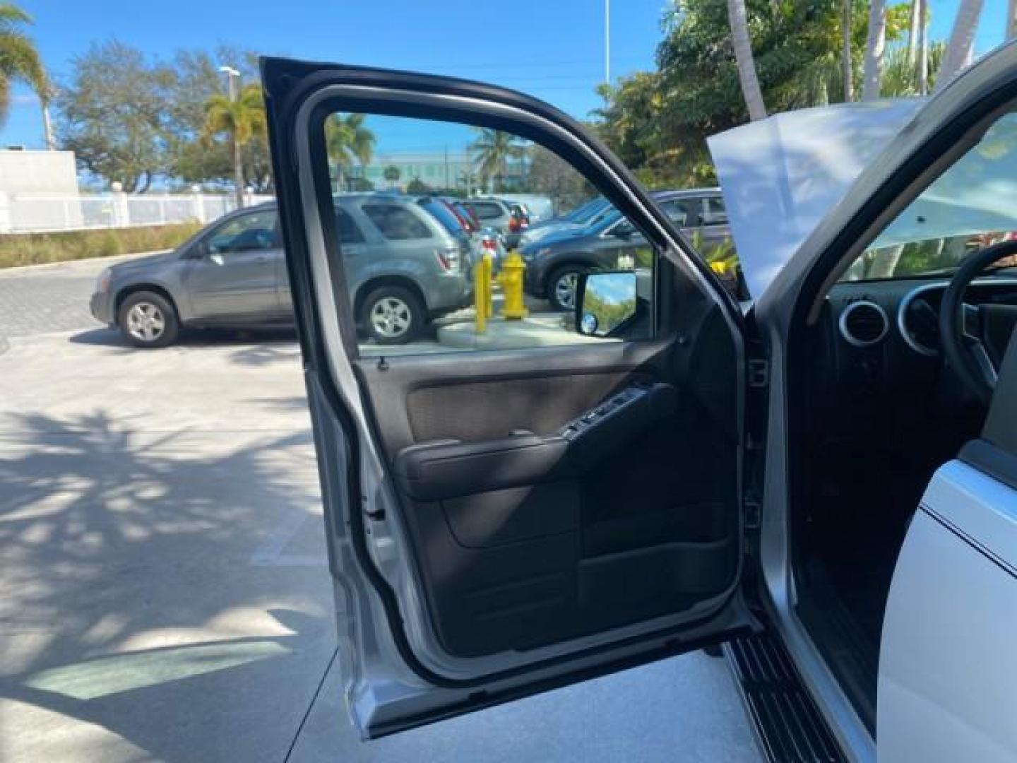 2010 Brilliant Silver Metallic /Charcoal Black Mercury Mountaineer 1 OWNER LOW MILES 78,753 (4M2EN3HE6AU) with an 4.0L SOHC 12-Valve V6 Engine engine, Automatic transmission, located at 4701 North Dixie Hwy, Pompano Beach, FL, 33064, (954) 422-2889, 26.240938, -80.123474 - OUR WEBPAGE FLORIDACARS1.COM HAS OVER 100 PHOTOS AND FREE CARFAX LINK 2010 MERCURY MOUNTAINEER 1 OWNER FLORIDA VIN: 4M2EN3HE6AUJ00892 4 M 2 E N 3 H E 6 A U J 0 0 8 9 2 4 DOOR WAGON/SPORT UTILITY 4.0L V6 F SOHC 12V GASOLINE 20 MPG FRONT WHEEL DRIVE Features ABS Brakes Air Conditioning Alloy Wheels AM - Photo#9