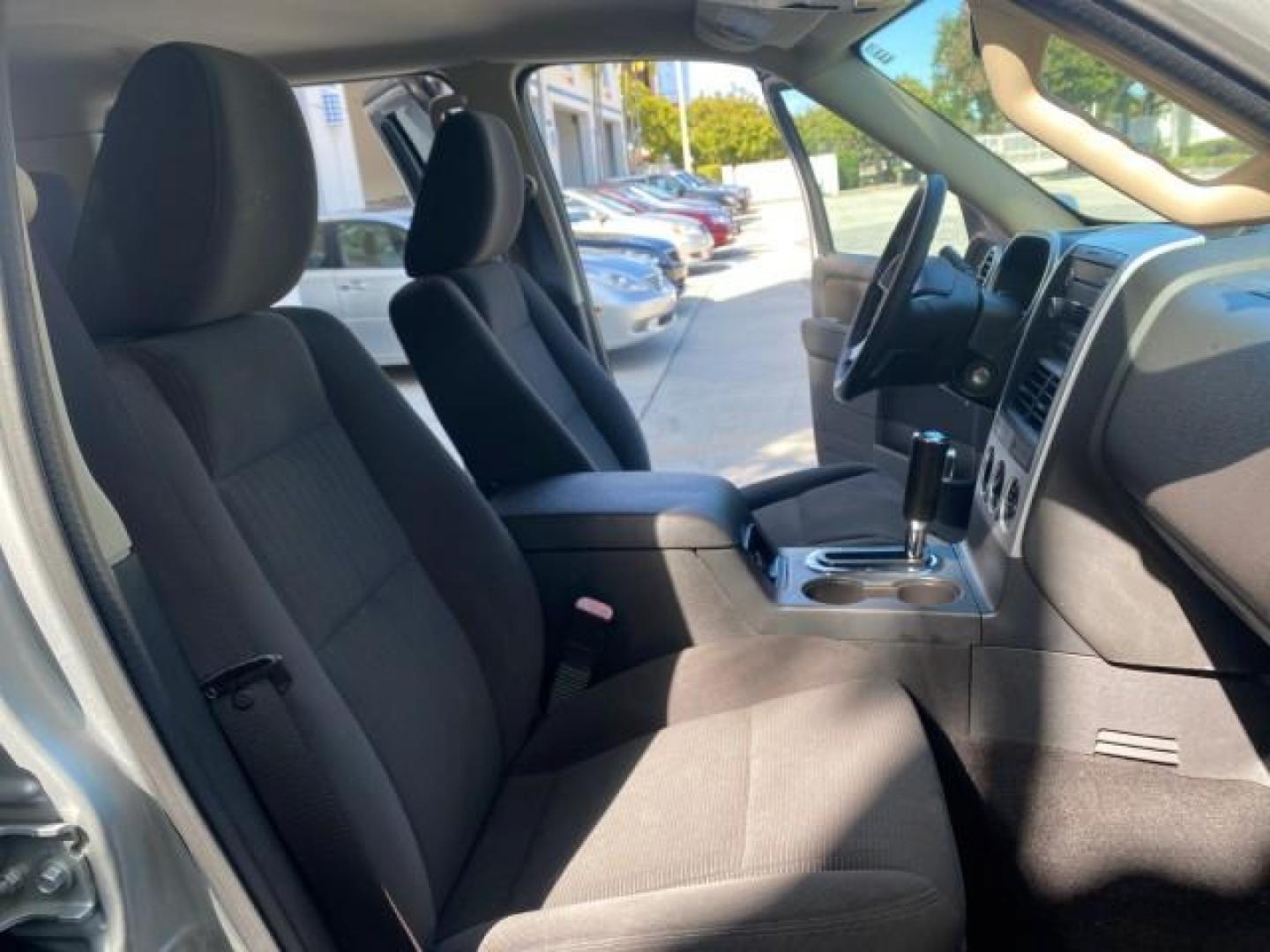 2010 Brilliant Silver Metallic /Charcoal Black Mercury Mountaineer 1 OWNER LOW MILES 78,753 (4M2EN3HE6AU) with an 4.0L SOHC 12-Valve V6 Engine engine, Automatic transmission, located at 4701 North Dixie Hwy, Pompano Beach, FL, 33064, (954) 422-2889, 26.240938, -80.123474 - OUR WEBPAGE FLORIDACARS1.COM HAS OVER 100 PHOTOS AND FREE CARFAX LINK 2010 MERCURY MOUNTAINEER 1 OWNER FLORIDA VIN: 4M2EN3HE6AUJ00892 4 M 2 E N 3 H E 6 A U J 0 0 8 9 2 4 DOOR WAGON/SPORT UTILITY 4.0L V6 F SOHC 12V GASOLINE 20 MPG FRONT WHEEL DRIVE Features ABS Brakes Air Conditioning Alloy Wheels AM - Photo#12