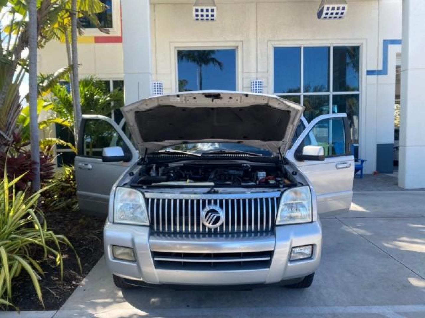 2010 Brilliant Silver Metallic /Charcoal Black Mercury Mountaineer 1 OWNER LOW MILES 78,753 (4M2EN3HE6AU) with an 4.0L SOHC 12-Valve V6 Engine engine, Automatic transmission, located at 4701 North Dixie Hwy, Pompano Beach, FL, 33064, (954) 422-2889, 26.240938, -80.123474 - OUR WEBPAGE FLORIDACARS1.COM HAS OVER 100 PHOTOS AND FREE CARFAX LINK 2010 MERCURY MOUNTAINEER 1 OWNER FLORIDA VIN: 4M2EN3HE6AUJ00892 4 M 2 E N 3 H E 6 A U J 0 0 8 9 2 4 DOOR WAGON/SPORT UTILITY 4.0L V6 F SOHC 12V GASOLINE 20 MPG FRONT WHEEL DRIVE Features ABS Brakes Air Conditioning Alloy Wheels AM - Photo#17