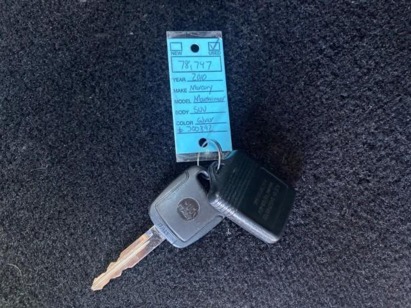 2010 Brilliant Silver Metallic /Charcoal Black Mercury Mountaineer 1 OWNER LOW MILES 78,753 (4M2EN3HE6AU) with an 4.0L SOHC 12-Valve V6 Engine engine, Automatic transmission, located at 4701 North Dixie Hwy, Pompano Beach, FL, 33064, (954) 422-2889, 26.240938, -80.123474 - OUR WEBPAGE FLORIDACARS1.COM HAS OVER 100 PHOTOS AND FREE CARFAX LINK 2010 MERCURY MOUNTAINEER 1 OWNER FLORIDA VIN: 4M2EN3HE6AUJ00892 4 M 2 E N 3 H E 6 A U J 0 0 8 9 2 4 DOOR WAGON/SPORT UTILITY 4.0L V6 F SOHC 12V GASOLINE 20 MPG FRONT WHEEL DRIVE Features ABS Brakes Air Conditioning Alloy Wheels AM - Photo#23