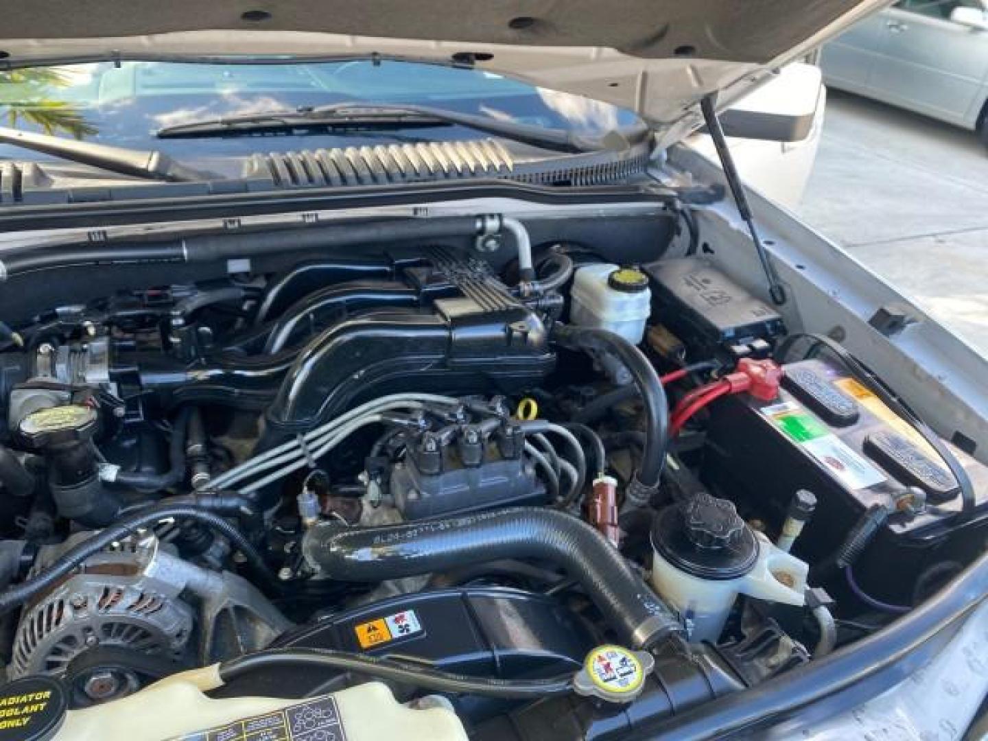 2010 Brilliant Silver Metallic /Charcoal Black Mercury Mountaineer 1 OWNER LOW MILES 78,753 (4M2EN3HE6AU) with an 4.0L SOHC 12-Valve V6 Engine engine, Automatic transmission, located at 4701 North Dixie Hwy, Pompano Beach, FL, 33064, (954) 422-2889, 26.240938, -80.123474 - OUR WEBPAGE FLORIDACARS1.COM HAS OVER 100 PHOTOS AND FREE CARFAX LINK 2010 MERCURY MOUNTAINEER 1 OWNER FLORIDA VIN: 4M2EN3HE6AUJ00892 4 M 2 E N 3 H E 6 A U J 0 0 8 9 2 4 DOOR WAGON/SPORT UTILITY 4.0L V6 F SOHC 12V GASOLINE 20 MPG FRONT WHEEL DRIVE Features ABS Brakes Air Conditioning Alloy Wheels AM - Photo#25