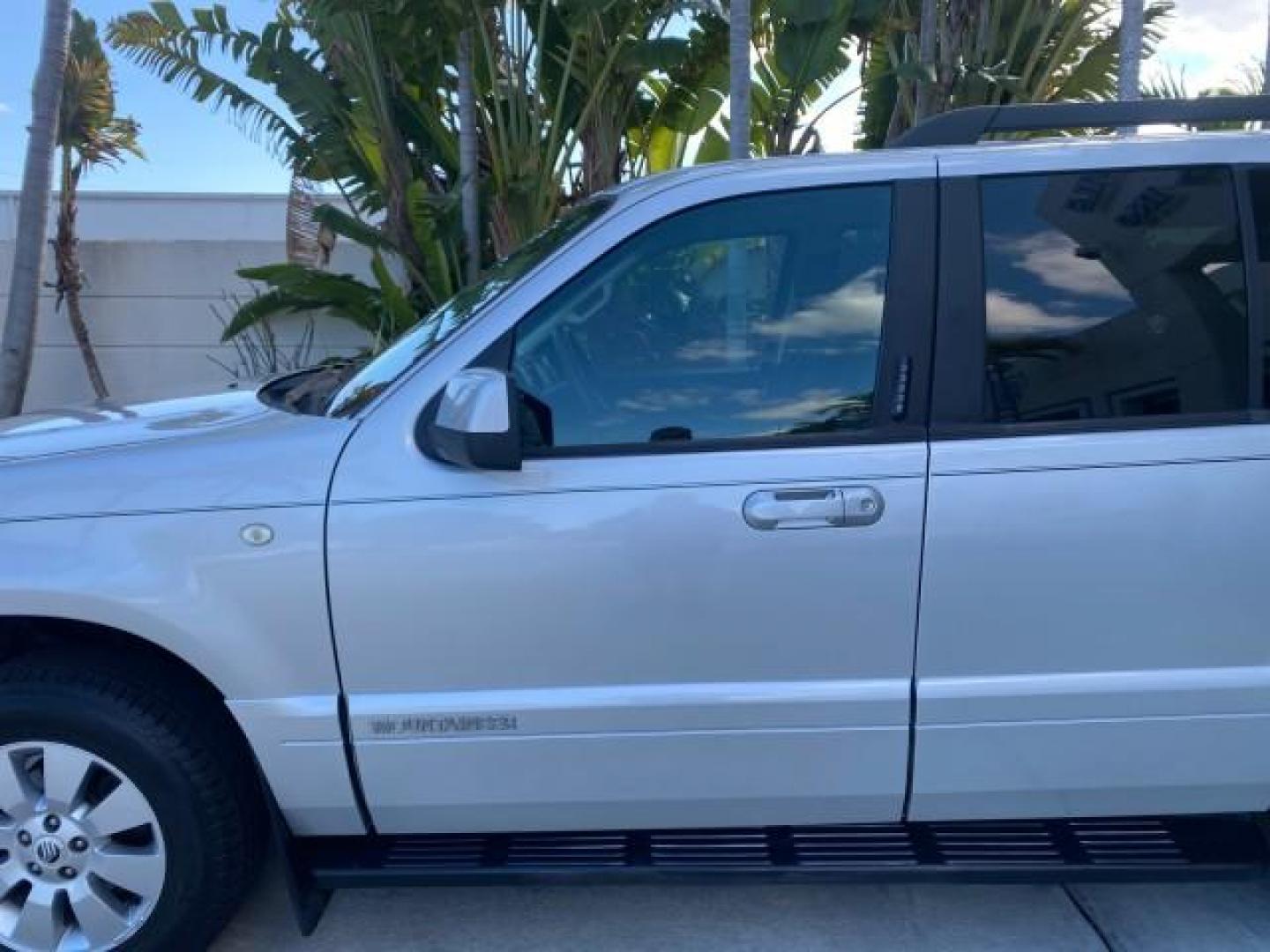2010 Brilliant Silver Metallic /Charcoal Black Mercury Mountaineer 1 OWNER LOW MILES 78,753 (4M2EN3HE6AU) with an 4.0L SOHC 12-Valve V6 Engine engine, Automatic transmission, located at 4701 North Dixie Hwy, Pompano Beach, FL, 33064, (954) 422-2889, 26.240938, -80.123474 - OUR WEBPAGE FLORIDACARS1.COM HAS OVER 100 PHOTOS AND FREE CARFAX LINK 2010 MERCURY MOUNTAINEER 1 OWNER FLORIDA VIN: 4M2EN3HE6AUJ00892 4 M 2 E N 3 H E 6 A U J 0 0 8 9 2 4 DOOR WAGON/SPORT UTILITY 4.0L V6 F SOHC 12V GASOLINE 20 MPG FRONT WHEEL DRIVE Features ABS Brakes Air Conditioning Alloy Wheels AM - Photo#37