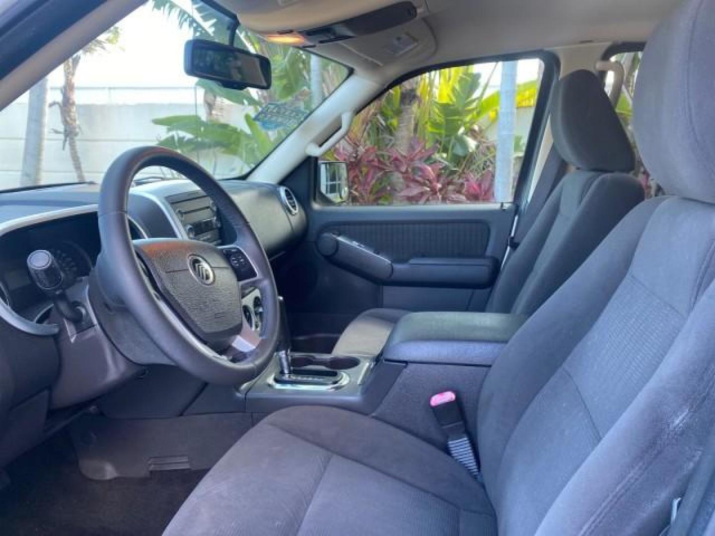 2010 Brilliant Silver Metallic /Charcoal Black Mercury Mountaineer 1 OWNER LOW MILES 78,753 (4M2EN3HE6AU) with an 4.0L SOHC 12-Valve V6 Engine engine, Automatic transmission, located at 4701 North Dixie Hwy, Pompano Beach, FL, 33064, (954) 422-2889, 26.240938, -80.123474 - OUR WEBPAGE FLORIDACARS1.COM HAS OVER 100 PHOTOS AND FREE CARFAX LINK 2010 MERCURY MOUNTAINEER 1 OWNER FLORIDA VIN: 4M2EN3HE6AUJ00892 4 M 2 E N 3 H E 6 A U J 0 0 8 9 2 4 DOOR WAGON/SPORT UTILITY 4.0L V6 F SOHC 12V GASOLINE 20 MPG FRONT WHEEL DRIVE Features ABS Brakes Air Conditioning Alloy Wheels AM - Photo#46