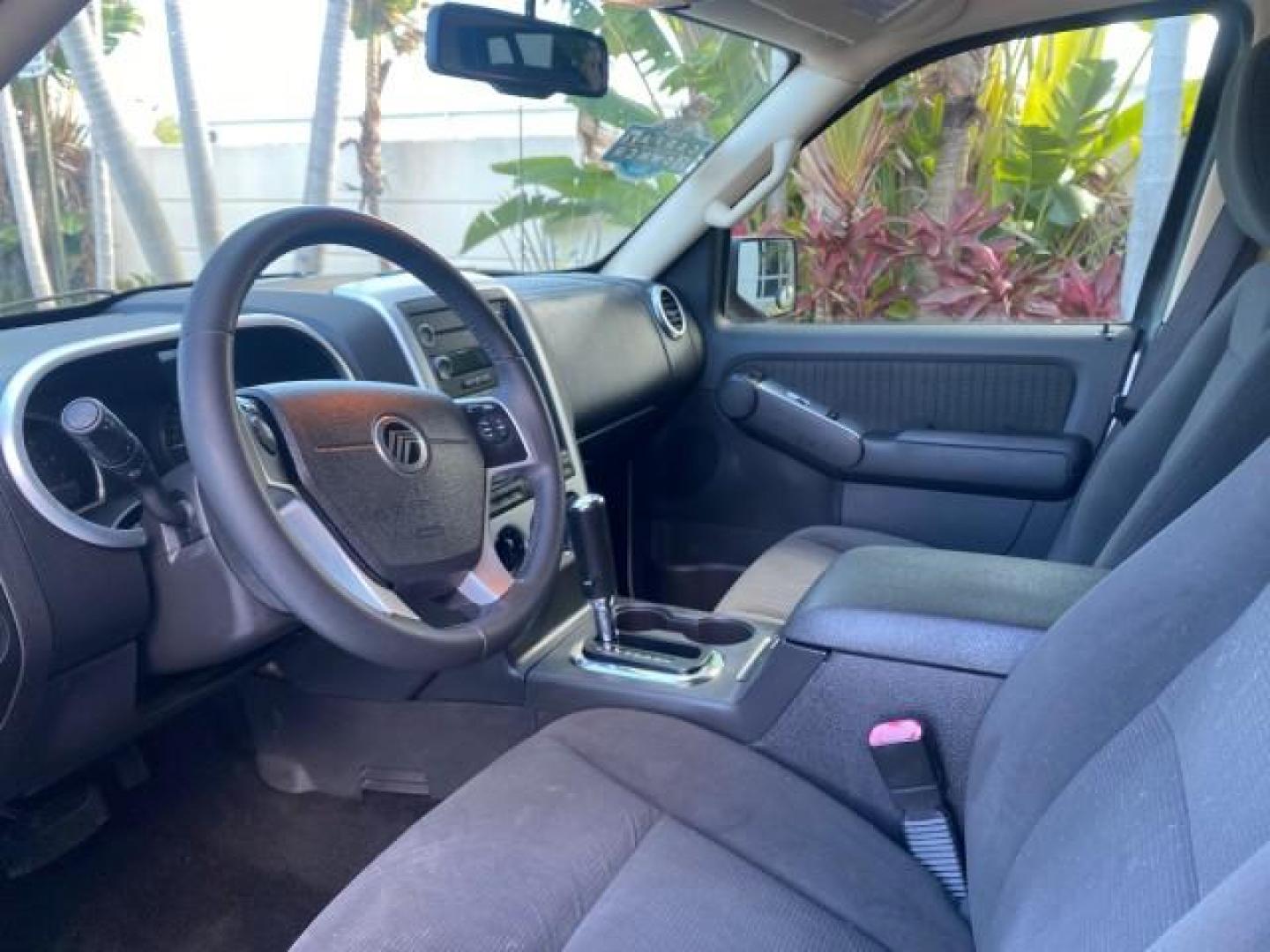2010 Brilliant Silver Metallic /Charcoal Black Mercury Mountaineer 1 OWNER LOW MILES 78,753 (4M2EN3HE6AU) with an 4.0L SOHC 12-Valve V6 Engine engine, Automatic transmission, located at 4701 North Dixie Hwy, Pompano Beach, FL, 33064, (954) 422-2889, 26.240938, -80.123474 - OUR WEBPAGE FLORIDACARS1.COM HAS OVER 100 PHOTOS AND FREE CARFAX LINK 2010 MERCURY MOUNTAINEER 1 OWNER FLORIDA VIN: 4M2EN3HE6AUJ00892 4 M 2 E N 3 H E 6 A U J 0 0 8 9 2 4 DOOR WAGON/SPORT UTILITY 4.0L V6 F SOHC 12V GASOLINE 20 MPG FRONT WHEEL DRIVE Features ABS Brakes Air Conditioning Alloy Wheels AM - Photo#47
