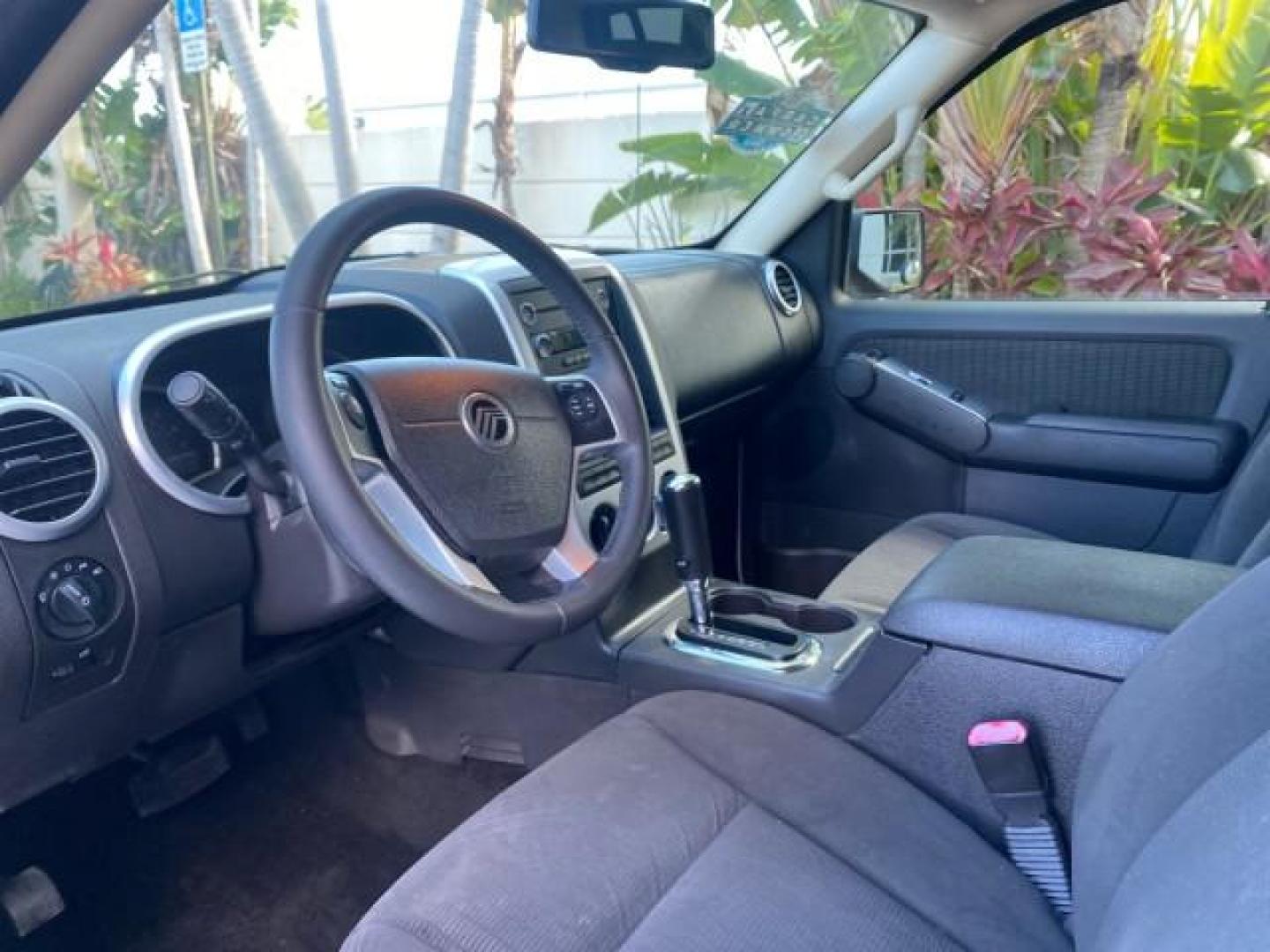 2010 Brilliant Silver Metallic /Charcoal Black Mercury Mountaineer 1 OWNER LOW MILES 78,753 (4M2EN3HE6AU) with an 4.0L SOHC 12-Valve V6 Engine engine, Automatic transmission, located at 4701 North Dixie Hwy, Pompano Beach, FL, 33064, (954) 422-2889, 26.240938, -80.123474 - OUR WEBPAGE FLORIDACARS1.COM HAS OVER 100 PHOTOS AND FREE CARFAX LINK 2010 MERCURY MOUNTAINEER 1 OWNER FLORIDA VIN: 4M2EN3HE6AUJ00892 4 M 2 E N 3 H E 6 A U J 0 0 8 9 2 4 DOOR WAGON/SPORT UTILITY 4.0L V6 F SOHC 12V GASOLINE 20 MPG FRONT WHEEL DRIVE Features ABS Brakes Air Conditioning Alloy Wheels AM - Photo#48