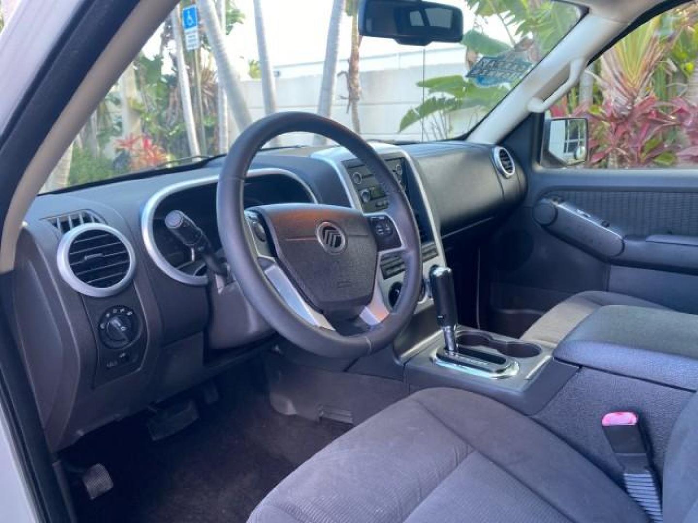 2010 Brilliant Silver Metallic /Charcoal Black Mercury Mountaineer 1 OWNER LOW MILES 78,753 (4M2EN3HE6AU) with an 4.0L SOHC 12-Valve V6 Engine engine, Automatic transmission, located at 4701 North Dixie Hwy, Pompano Beach, FL, 33064, (954) 422-2889, 26.240938, -80.123474 - OUR WEBPAGE FLORIDACARS1.COM HAS OVER 100 PHOTOS AND FREE CARFAX LINK 2010 MERCURY MOUNTAINEER 1 OWNER FLORIDA VIN: 4M2EN3HE6AUJ00892 4 M 2 E N 3 H E 6 A U J 0 0 8 9 2 4 DOOR WAGON/SPORT UTILITY 4.0L V6 F SOHC 12V GASOLINE 20 MPG FRONT WHEEL DRIVE Features ABS Brakes Air Conditioning Alloy Wheels AM - Photo#49