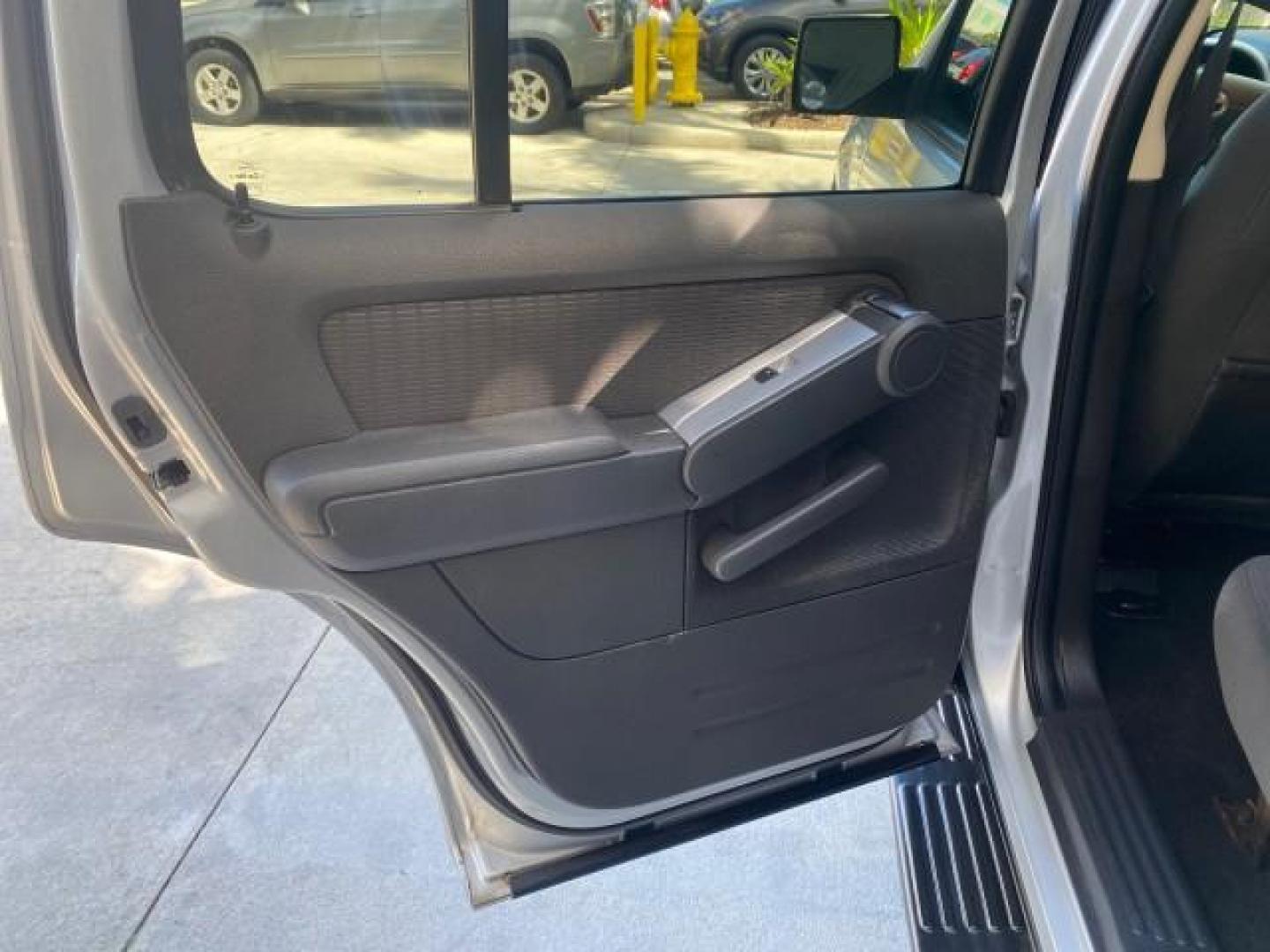 2010 Brilliant Silver Metallic /Charcoal Black Mercury Mountaineer 1 OWNER LOW MILES 78,753 (4M2EN3HE6AU) with an 4.0L SOHC 12-Valve V6 Engine engine, Automatic transmission, located at 4701 North Dixie Hwy, Pompano Beach, FL, 33064, (954) 422-2889, 26.240938, -80.123474 - OUR WEBPAGE FLORIDACARS1.COM HAS OVER 100 PHOTOS AND FREE CARFAX LINK 2010 MERCURY MOUNTAINEER 1 OWNER FLORIDA VIN: 4M2EN3HE6AUJ00892 4 M 2 E N 3 H E 6 A U J 0 0 8 9 2 4 DOOR WAGON/SPORT UTILITY 4.0L V6 F SOHC 12V GASOLINE 20 MPG FRONT WHEEL DRIVE Features ABS Brakes Air Conditioning Alloy Wheels AM - Photo#77