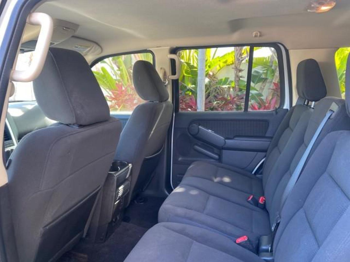 2010 Brilliant Silver Metallic /Charcoal Black Mercury Mountaineer 1 OWNER LOW MILES 78,753 (4M2EN3HE6AU) with an 4.0L SOHC 12-Valve V6 Engine engine, Automatic transmission, located at 4701 North Dixie Hwy, Pompano Beach, FL, 33064, (954) 422-2889, 26.240938, -80.123474 - OUR WEBPAGE FLORIDACARS1.COM HAS OVER 100 PHOTOS AND FREE CARFAX LINK 2010 MERCURY MOUNTAINEER 1 OWNER FLORIDA VIN: 4M2EN3HE6AUJ00892 4 M 2 E N 3 H E 6 A U J 0 0 8 9 2 4 DOOR WAGON/SPORT UTILITY 4.0L V6 F SOHC 12V GASOLINE 20 MPG FRONT WHEEL DRIVE Features ABS Brakes Air Conditioning Alloy Wheels AM - Photo#79