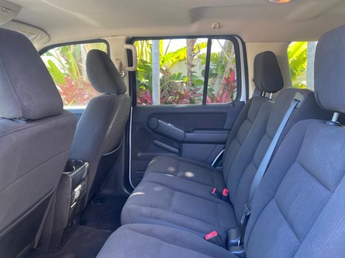 2010 Brilliant Silver Metallic /Charcoal Black Mercury Mountaineer 1 OWNER LOW MILES 78,753 (4M2EN3HE6AU) with an 4.0L SOHC 12-Valve V6 Engine engine, Automatic transmission, located at 4701 North Dixie Hwy, Pompano Beach, FL, 33064, (954) 422-2889, 26.240938, -80.123474 - OUR WEBPAGE FLORIDACARS1.COM HAS OVER 100 PHOTOS AND FREE CARFAX LINK 2010 MERCURY MOUNTAINEER 1 OWNER FLORIDA VIN: 4M2EN3HE6AUJ00892 4 M 2 E N 3 H E 6 A U J 0 0 8 9 2 4 DOOR WAGON/SPORT UTILITY 4.0L V6 F SOHC 12V GASOLINE 20 MPG FRONT WHEEL DRIVE Features ABS Brakes Air Conditioning Alloy Wheels AM - Photo#80
