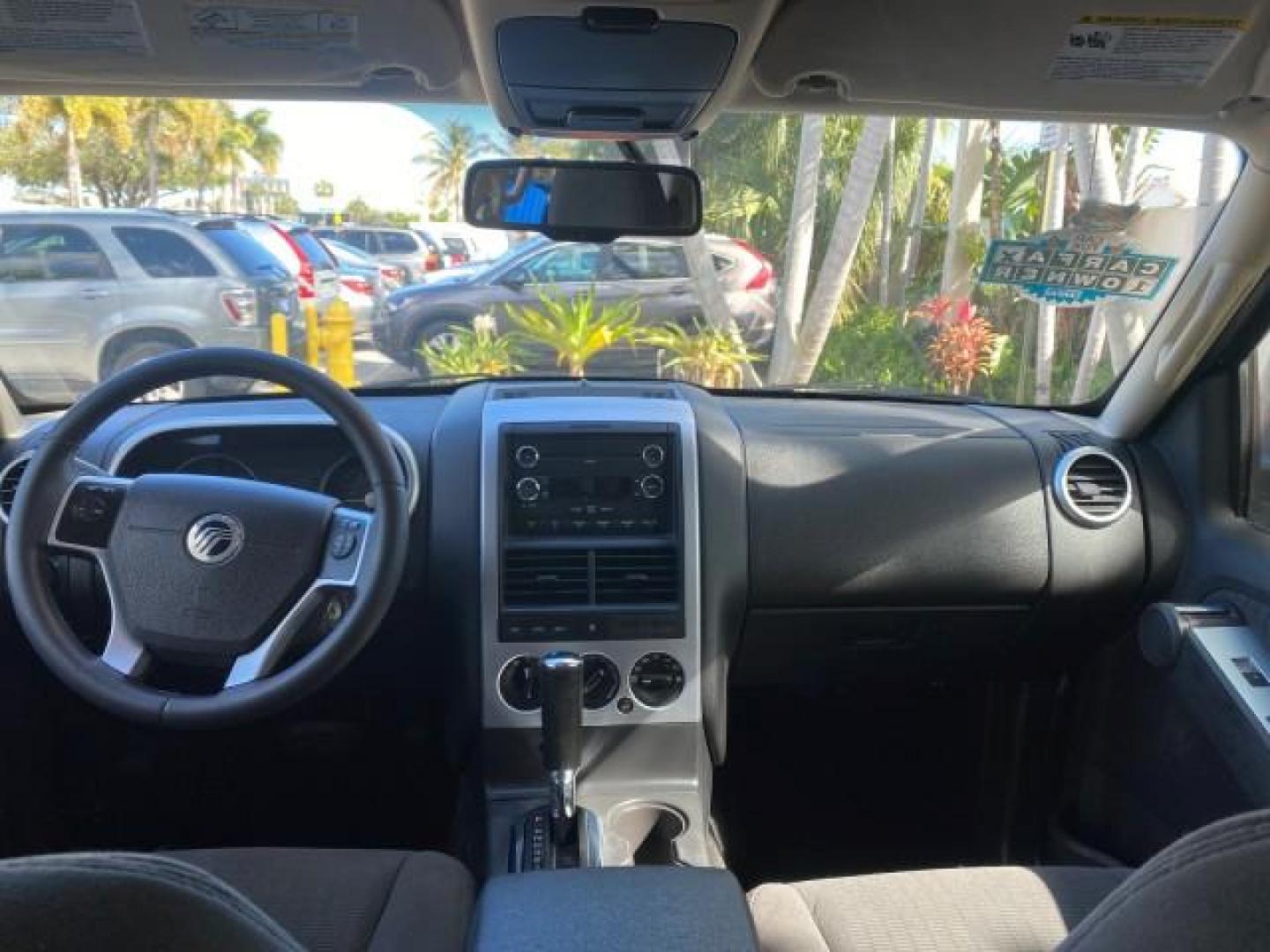 2010 Brilliant Silver Metallic /Charcoal Black Mercury Mountaineer 1 OWNER LOW MILES 78,753 (4M2EN3HE6AU) with an 4.0L SOHC 12-Valve V6 Engine engine, Automatic transmission, located at 4701 North Dixie Hwy, Pompano Beach, FL, 33064, (954) 422-2889, 26.240938, -80.123474 - OUR WEBPAGE FLORIDACARS1.COM HAS OVER 100 PHOTOS AND FREE CARFAX LINK 2010 MERCURY MOUNTAINEER 1 OWNER FLORIDA VIN: 4M2EN3HE6AUJ00892 4 M 2 E N 3 H E 6 A U J 0 0 8 9 2 4 DOOR WAGON/SPORT UTILITY 4.0L V6 F SOHC 12V GASOLINE 20 MPG FRONT WHEEL DRIVE Features ABS Brakes Air Conditioning Alloy Wheels AM - Photo#82
